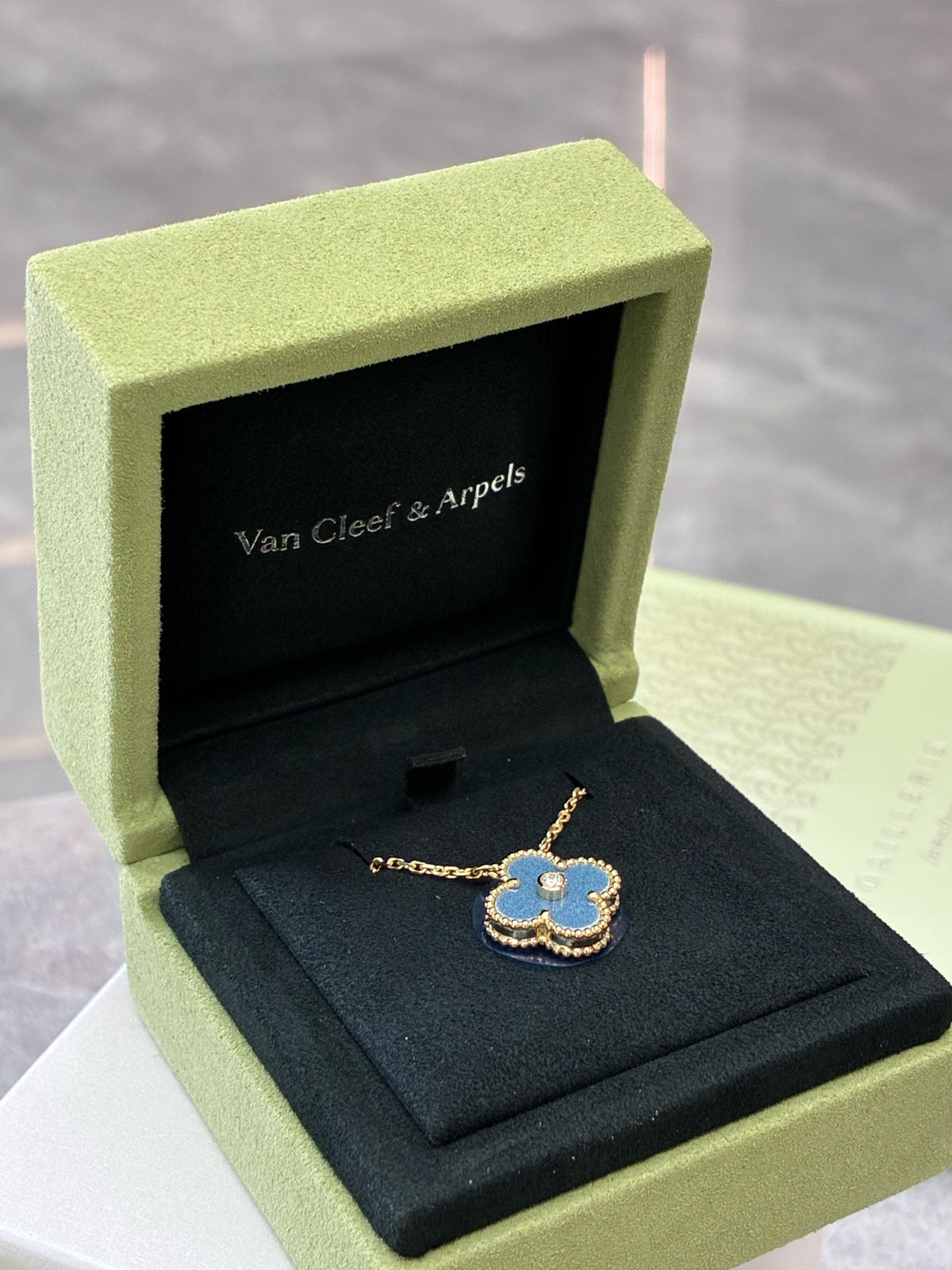 VAN CLEEF & ARPELS Holiday Limited Edition 2026 Alhambra Pendant – Blue-Grey Ceramic with Gold and Diamond Rim, Brand New