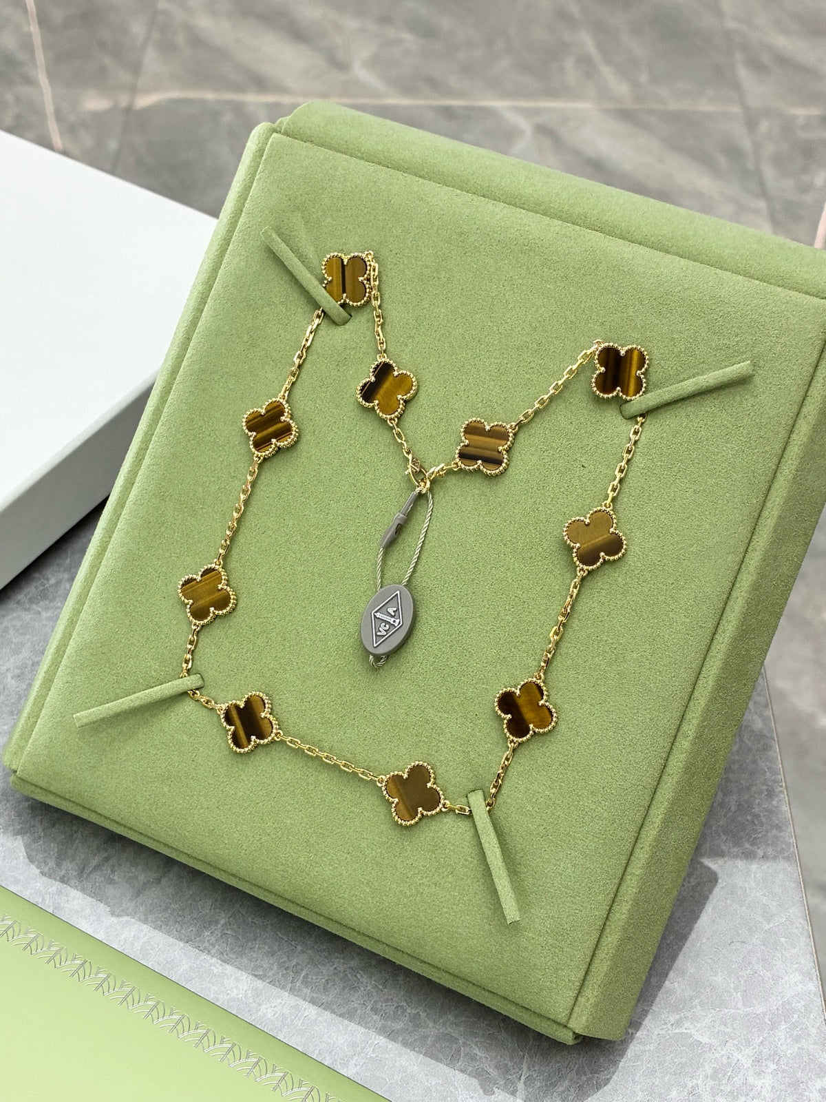 VAN CLEEF & ARPELS Vintage Alhambra Necklace – Ten Motifs in Tiger's Eye with Beaded Gold Rims, Brand New