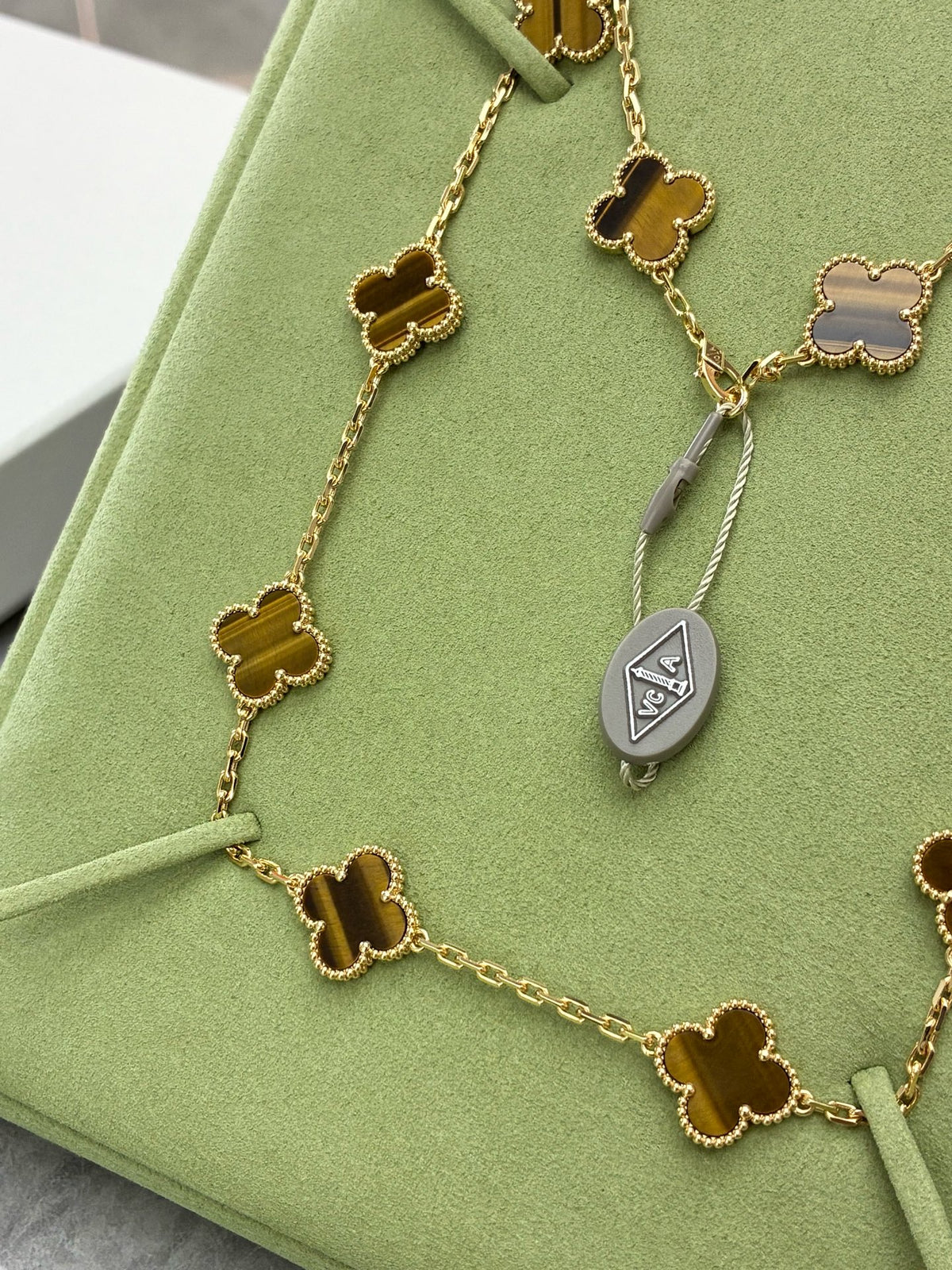 VAN CLEEF & ARPELS Vintage Alhambra Necklace – Ten Motifs in Tiger's Eye with Beaded Gold Rims, Brand New