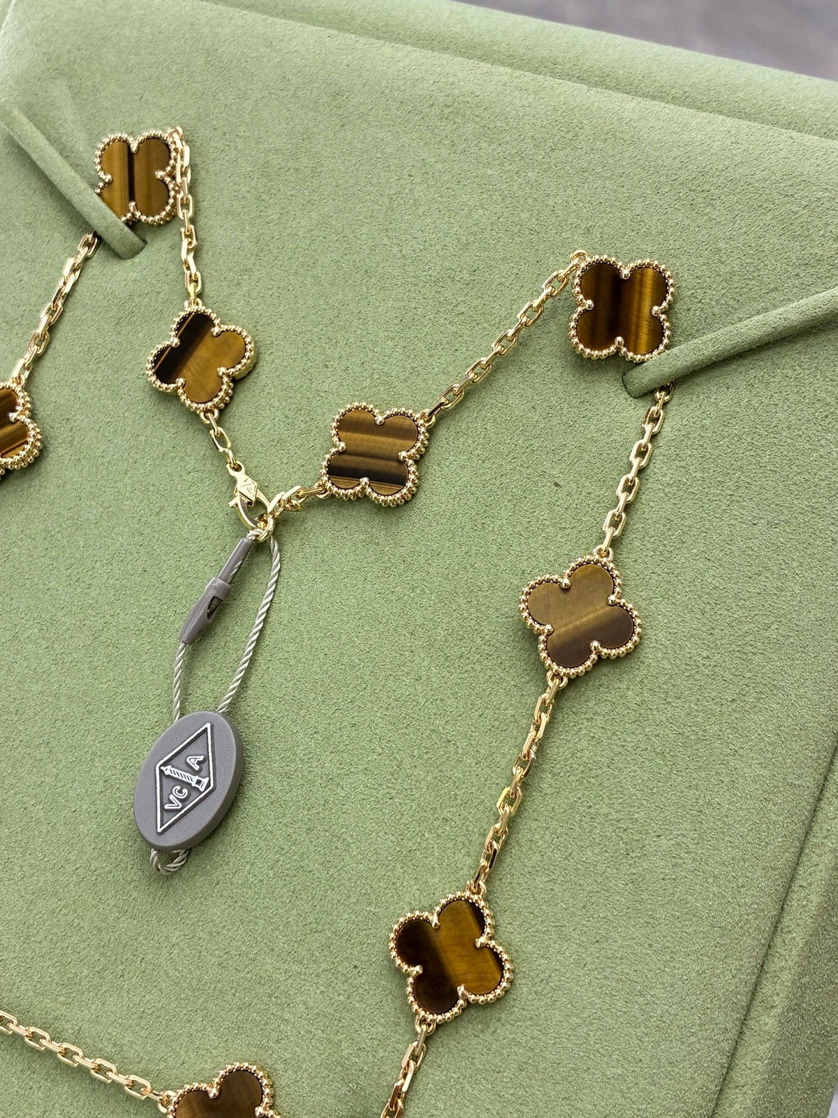 VAN CLEEF & ARPELS Vintage Alhambra Necklace – Ten Motifs in Tiger's Eye with Beaded Gold Rims, Brand New