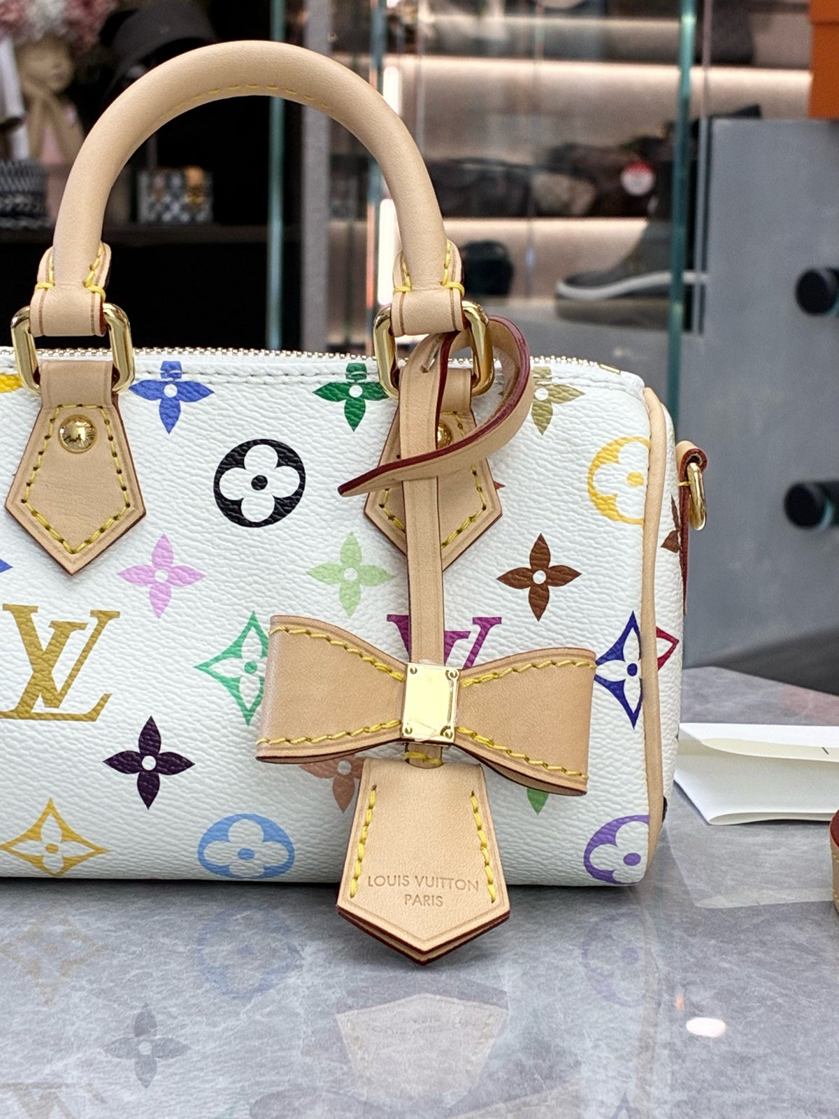 LOUIS VUITTON Nano Speedy – White Monogram Multicolore Canvas with Vachetta Handles, Microchip Era, 99% New