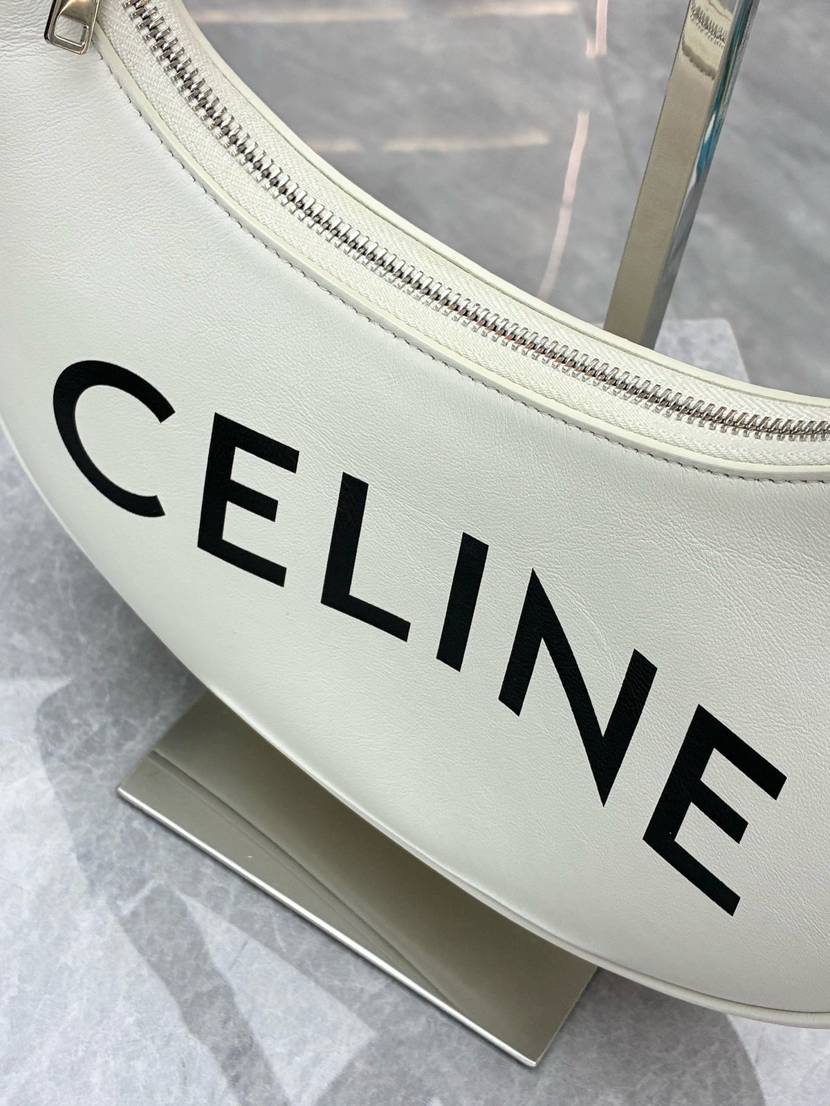 CELINE Ava Shoulder Bag – White Calfskin with Large Black CELINE Logo, Good Pre-Owned