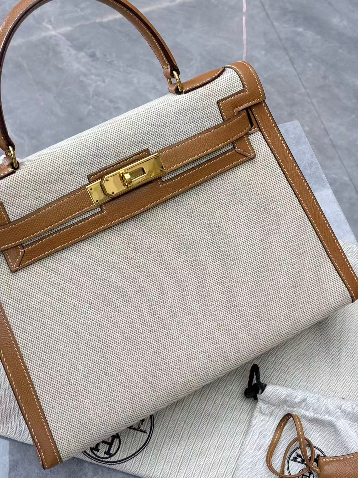 HERMÈS Kelly 28 – Toile Canvas with Gold Brown Epsom Leather, Gold-Tone Hardware, P Stamp, Good Pre-Owned