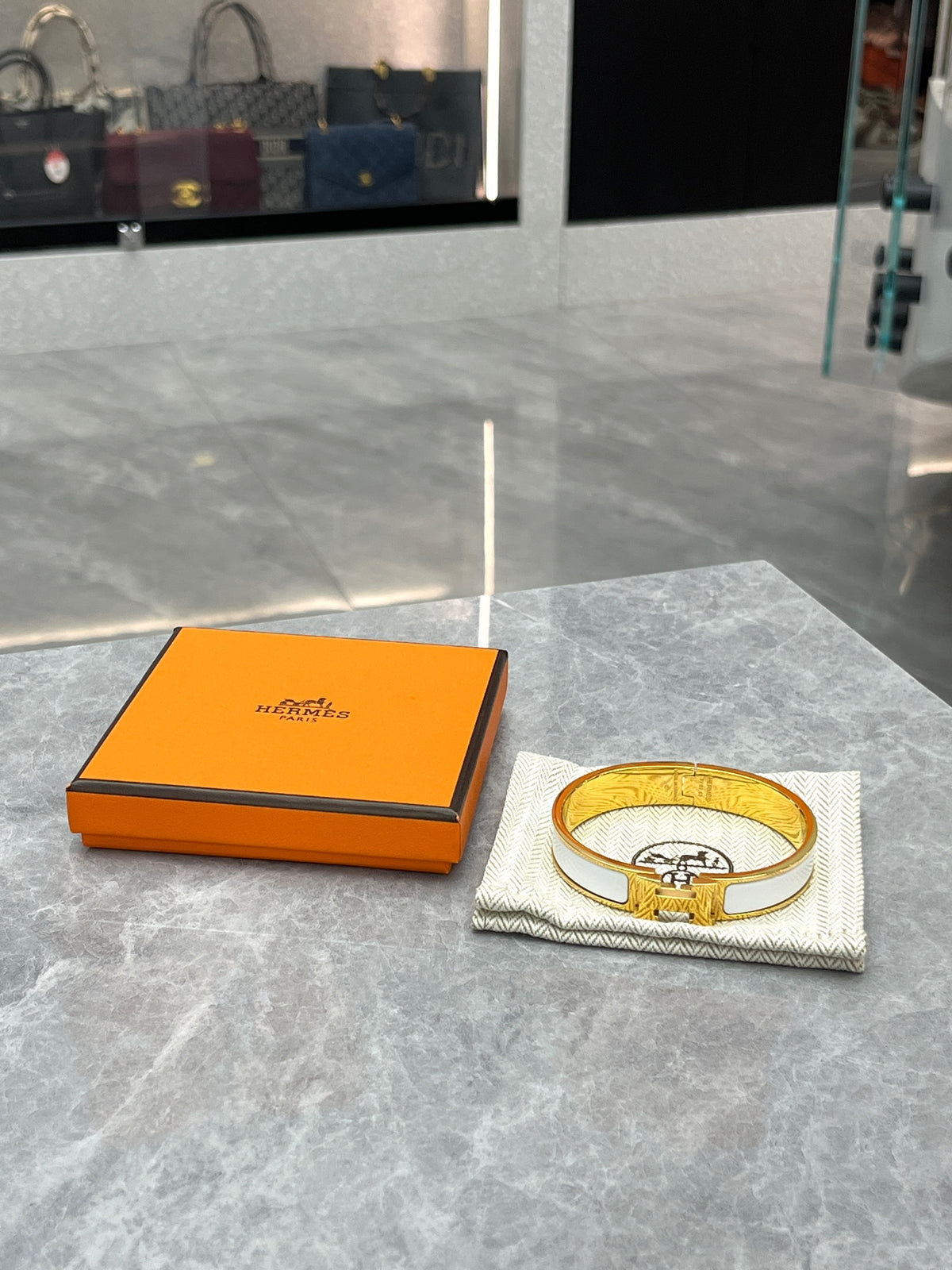 HERMÈS Clic H Bracelet – White Enamel with Gold-Tone H Clasp, Good Pre-Owned