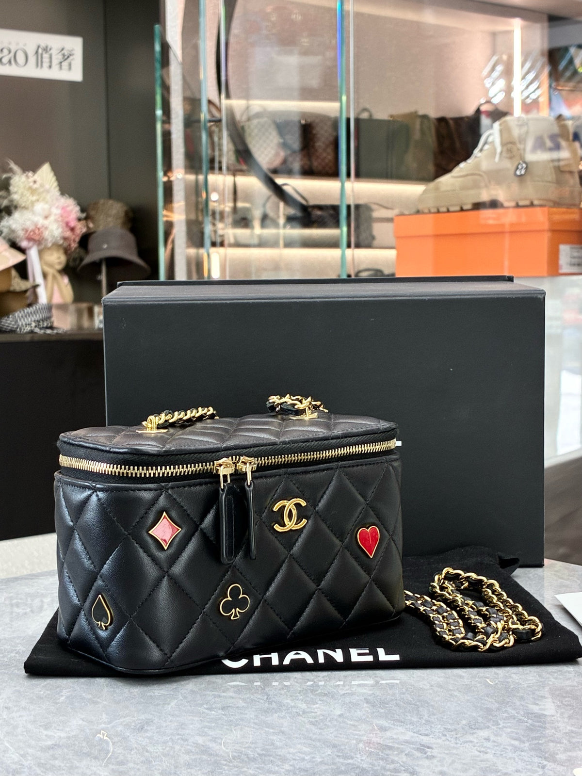 CHANEL 22K Vanity Case – Black Quilted Lambskin with Gold-Tone Chain and Poker-Suit Appliqués, Microchip Era, Good Pre-Owned