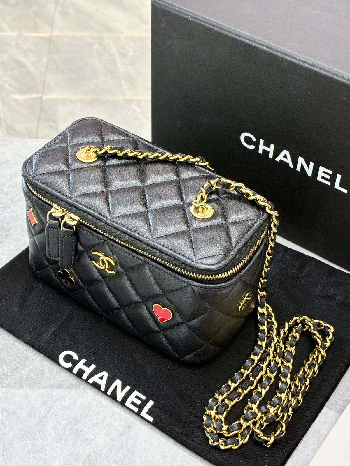 CHANEL 22K Vanity Case – Black Quilted Lambskin with Gold-Tone Chain and Poker-Suit Appliqués, Microchip Era, Good Pre-Owned