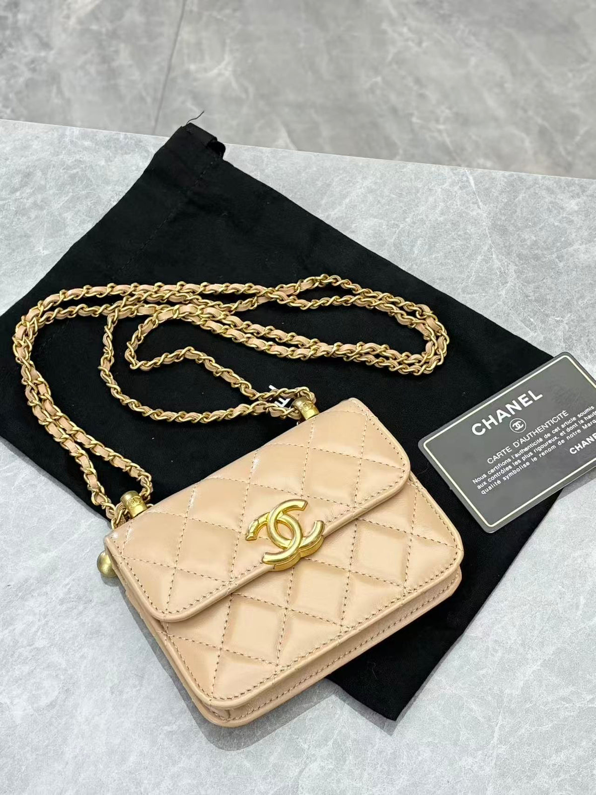 CHANEL 21A Wallet on Chain – Milk Tea Beige Quilted Lambskin with Gold Hardware and Double Gold Balls, 12.5 cm, 31 Series, Excellent Pre-Owned