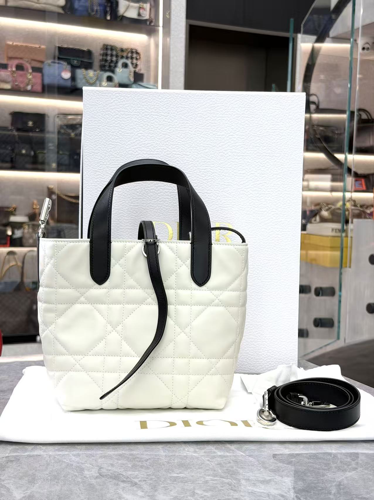 Dior Toujours vertical tote bag crafted in calfskin with macrocannage stitching