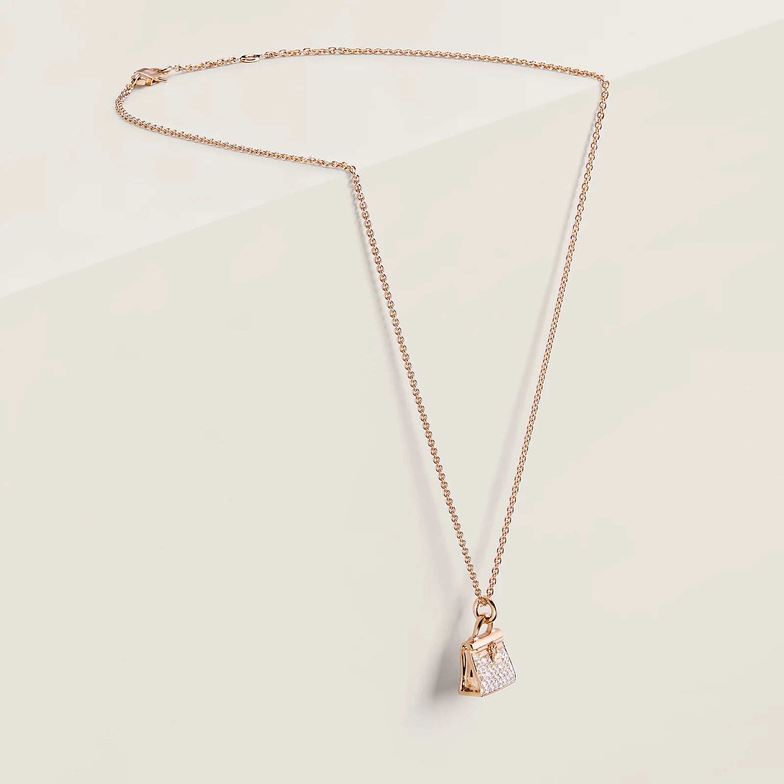 HERMÈS Amulettes Constance pendant (Rose Gold)