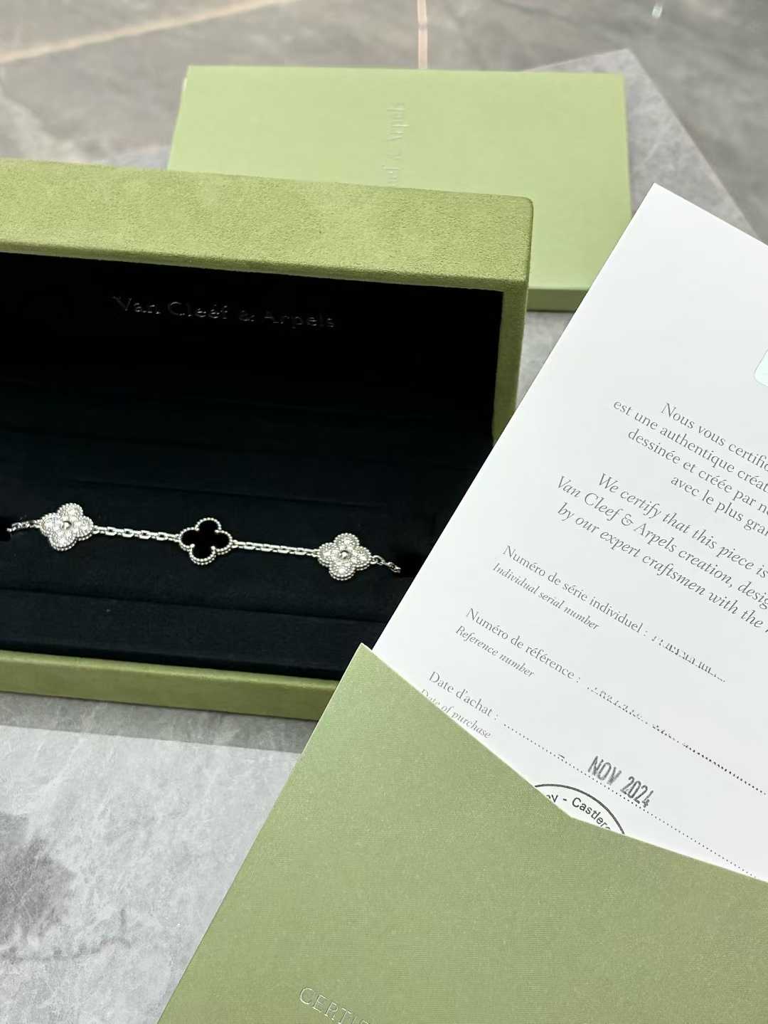 Van Cleef & Arpels Vintage Alhambra 5-motif bracelet in white gold with diamonds and black onyx