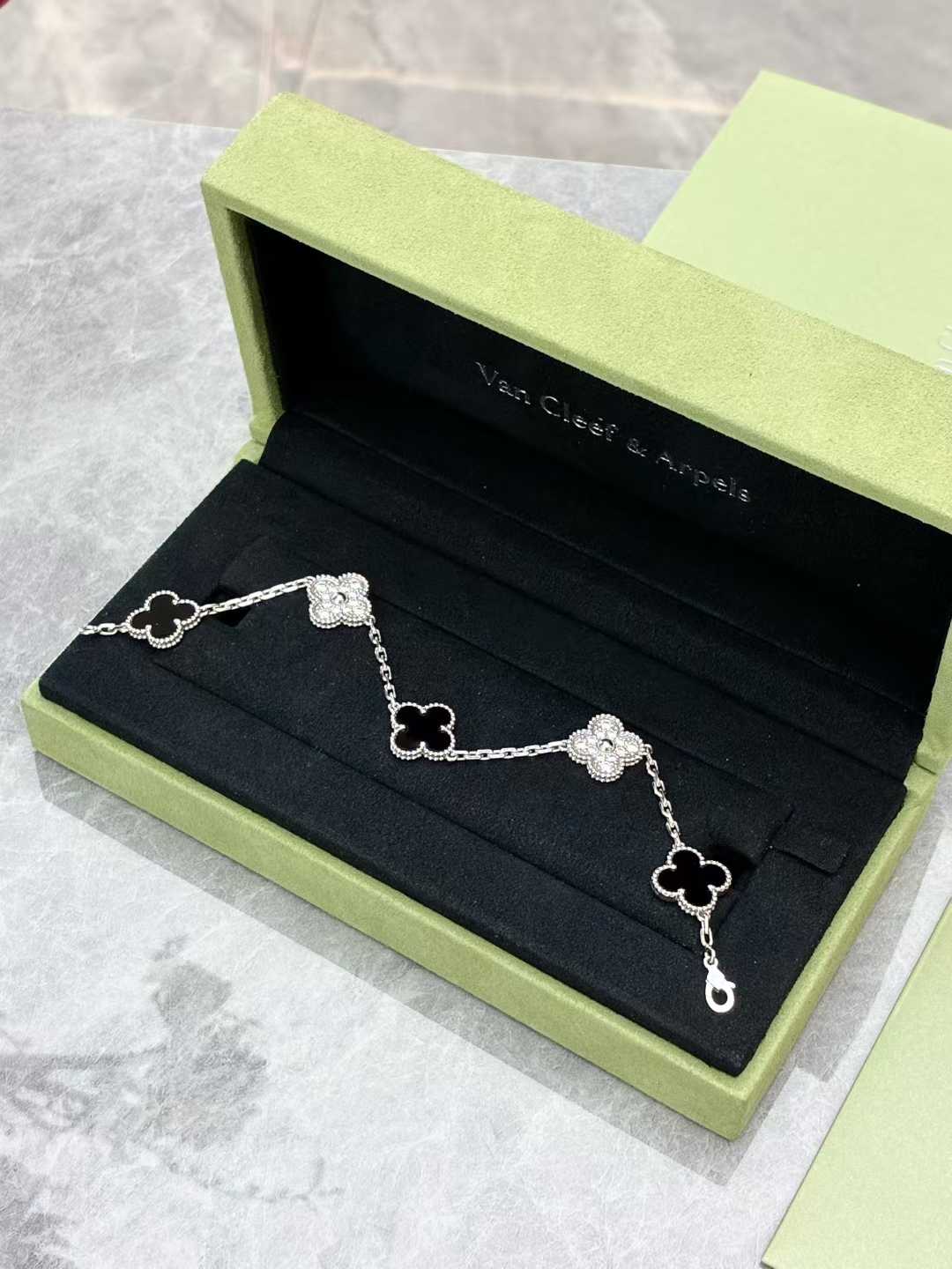 Van Cleef & Arpels Vintage Alhambra 5-motif bracelet in white gold with diamonds and black onyx