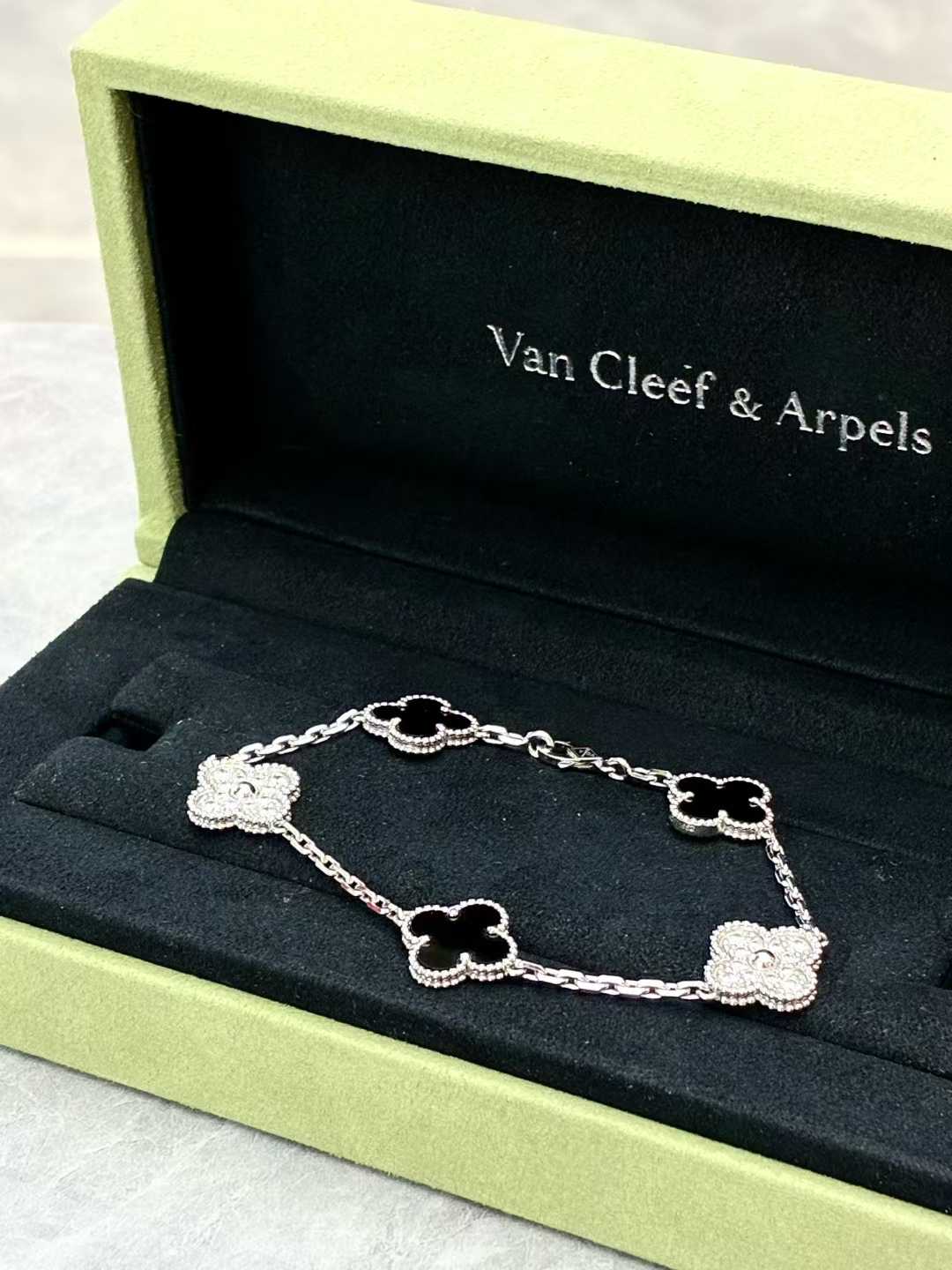 Van Cleef & Arpels Vintage Alhambra 5-motif bracelet in white gold with diamonds and black onyx
