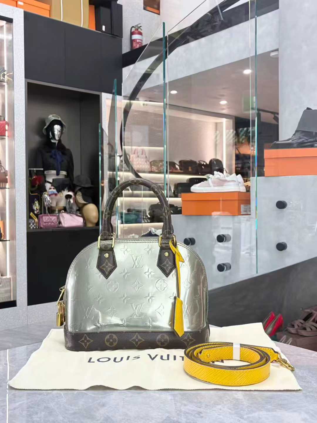 Louis Vuitton Alma Metallic Monogram Vernis BB Bitume Metallise Metallic Gray