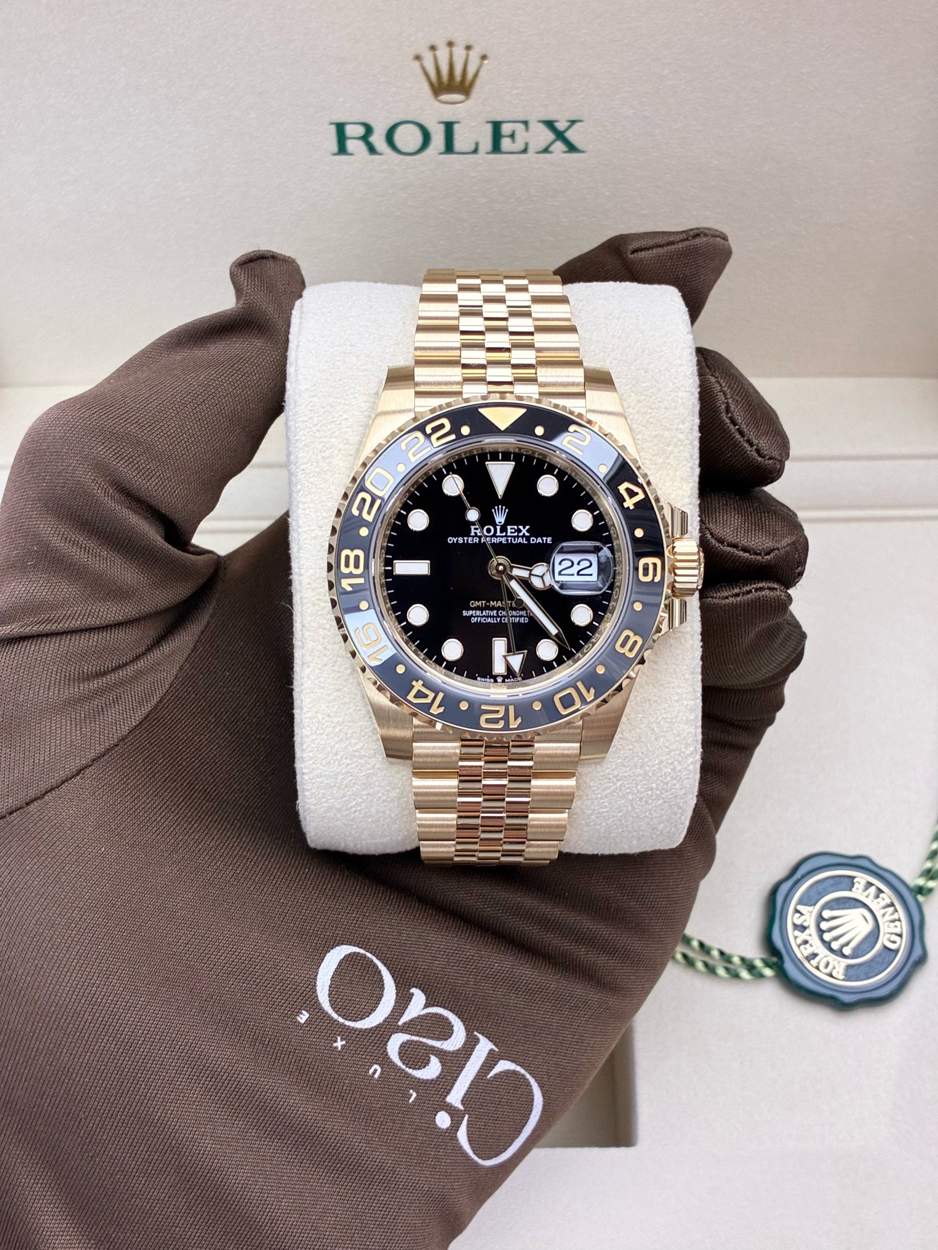 Rolex GMT-Master II, 18k yellow gold with a black dial and a grey and black Cerachrom bezel on a Jubilee bracelet
