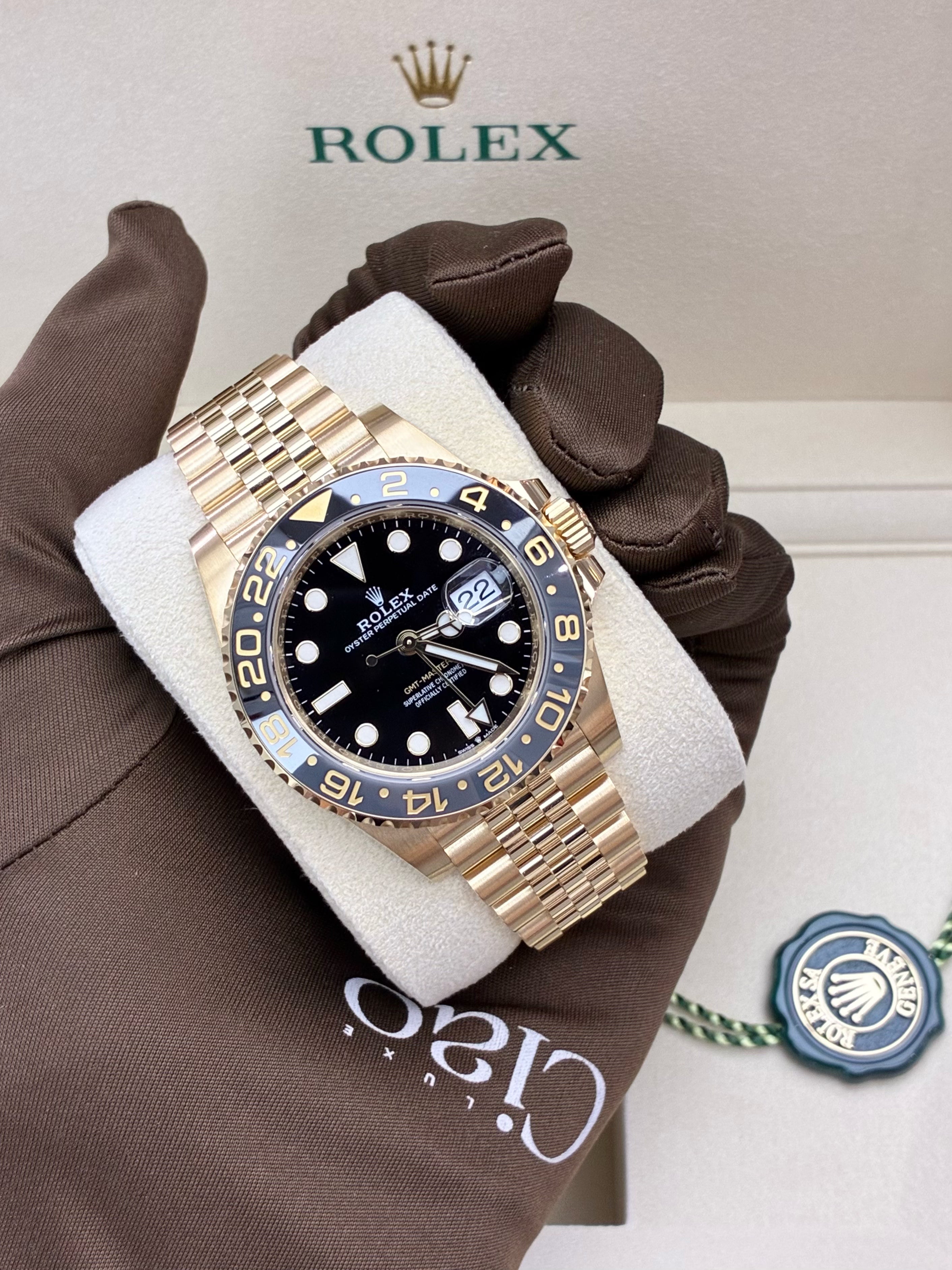 Rolex GMT-Master II, 18k yellow gold with a black dial and a grey and black Cerachrom bezel on a Jubilee bracelet