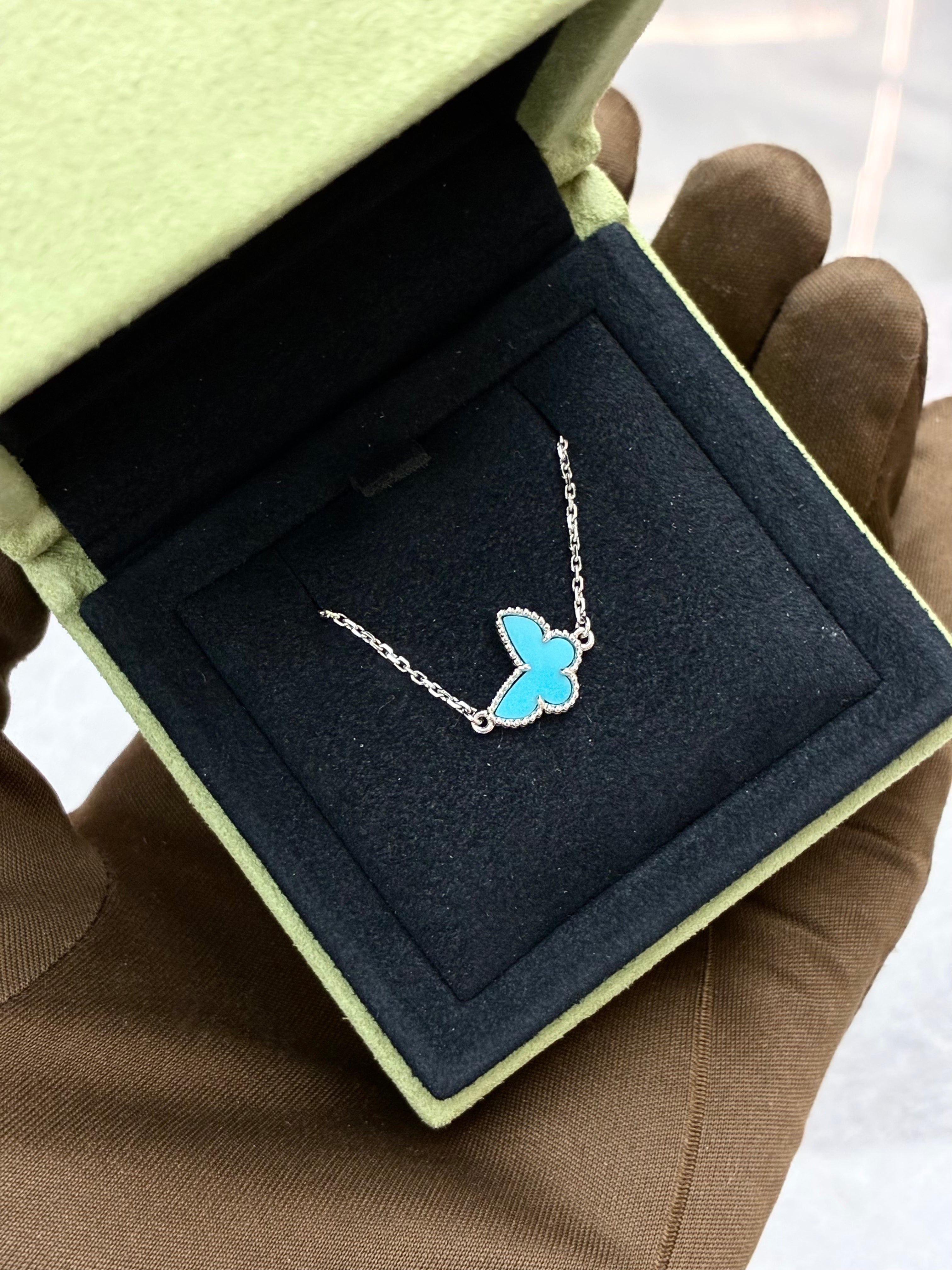 Van Cleef & Arpels Sweet Alhambra Butterfly Pendant in 18K white gold with turquoise