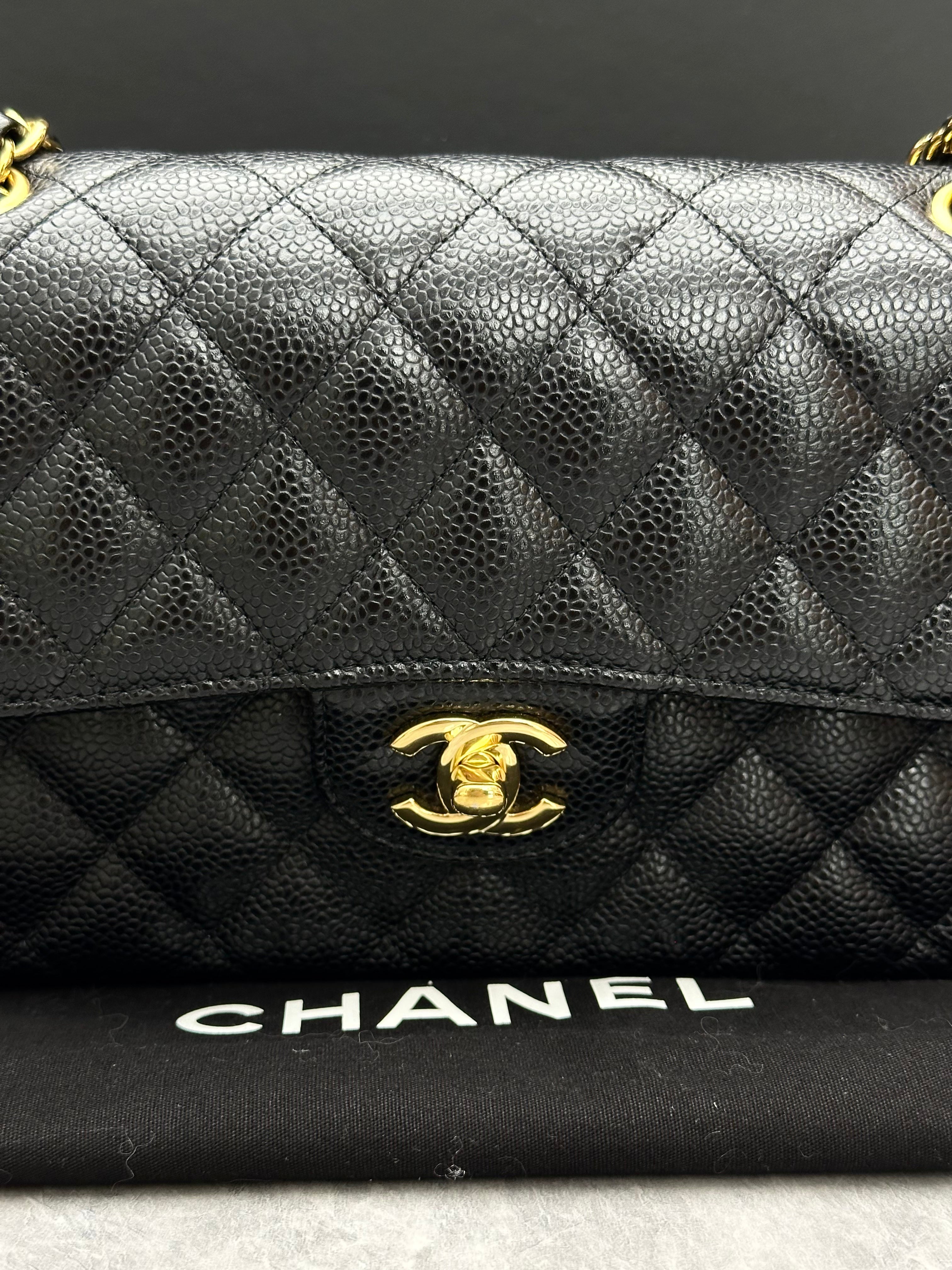 Chanel Classic Flap bag in black caviar leather with gold-tone hardware