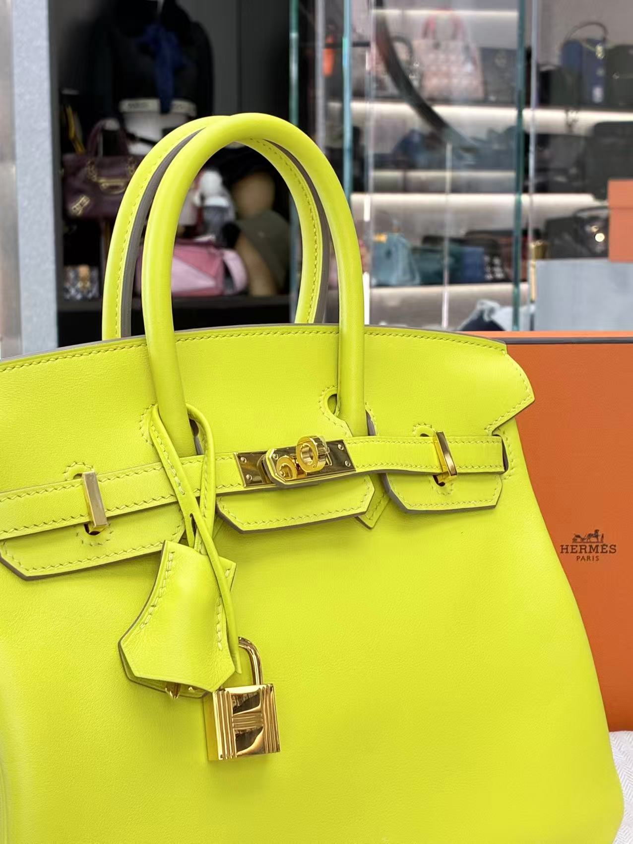 Hermès Birkin bag in the vibrant "Lime" color and Epsom leather with gold hardware