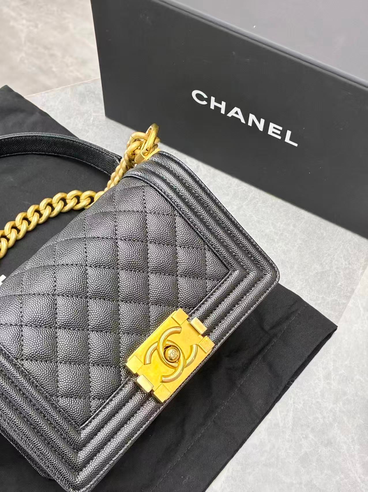 Chanel Boy Chanel chain shoulder bag in black caviar leather with gold-tone hardware