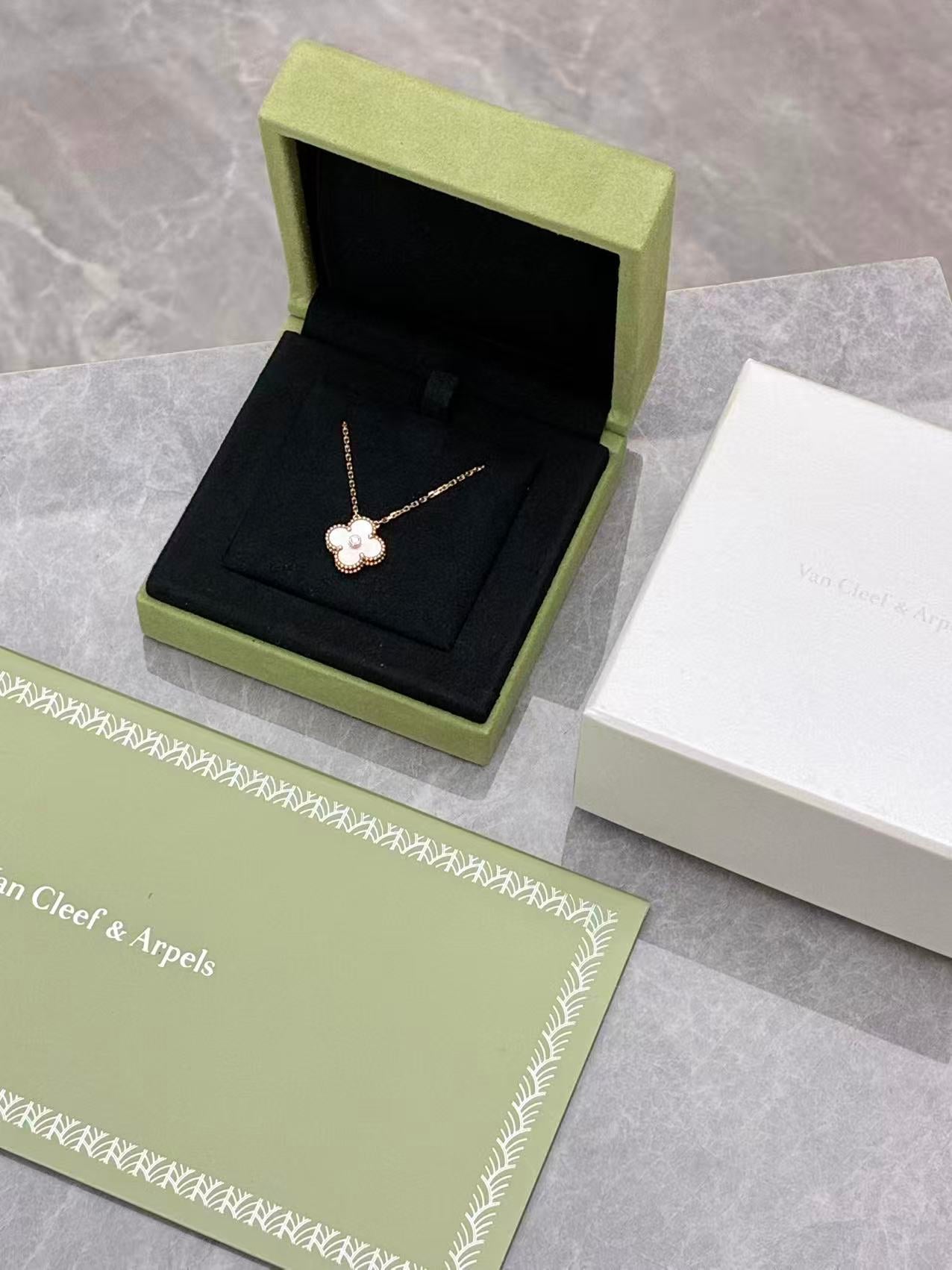 Van Cleef & Arpels 2025 Holiday Limited Edition Alhambra pendant necklace in pink mother-of-pearl