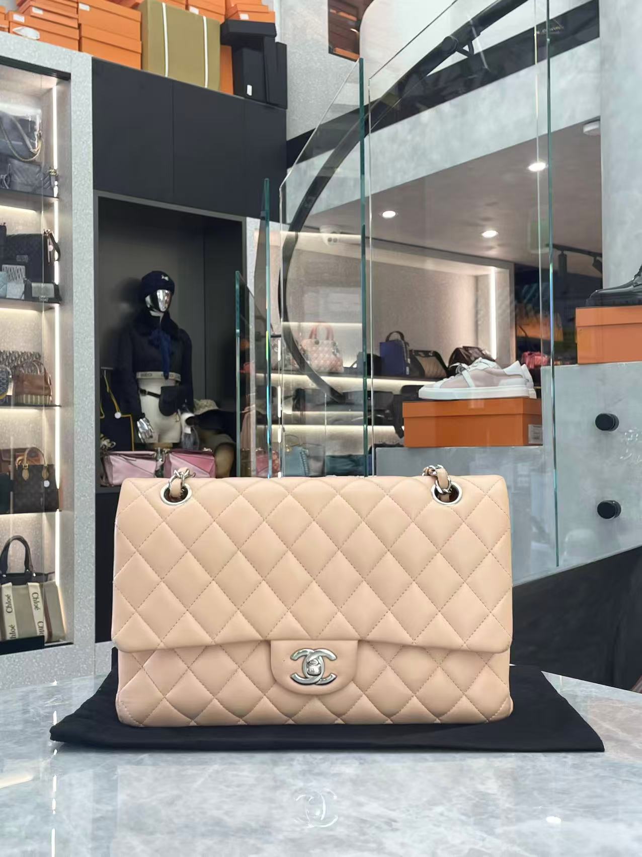 Chanel beige quilted Jumbo Classic Double Flap Bag with silver hardware