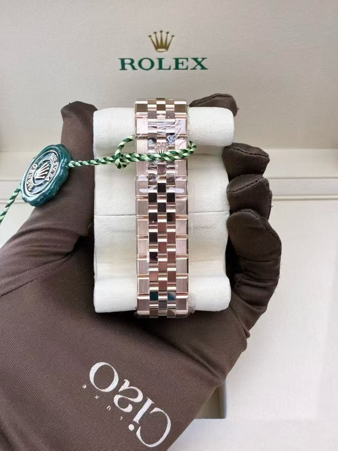Rolex Land-Dweller in 18k rose gold with a white honeycomb dial