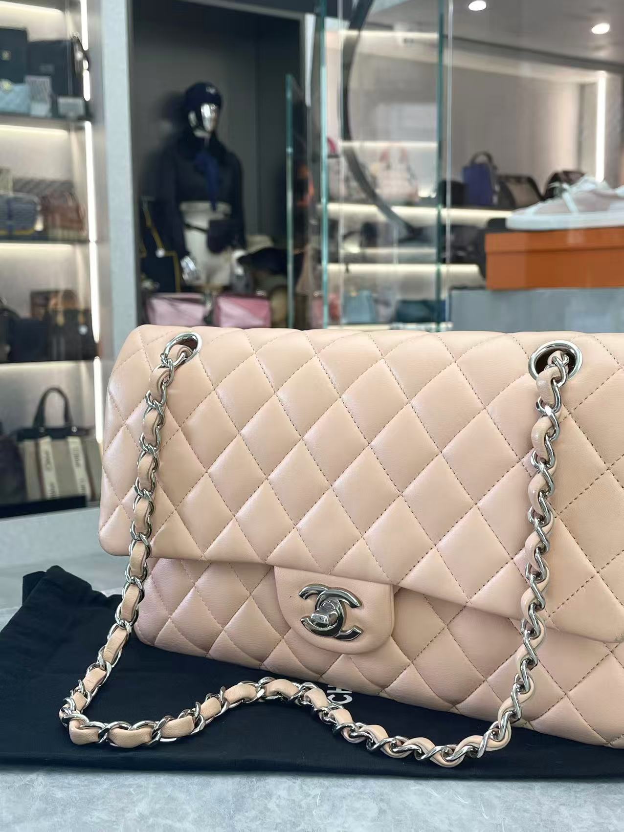 Chanel beige quilted Jumbo Classic Double Flap Bag with silver hardware