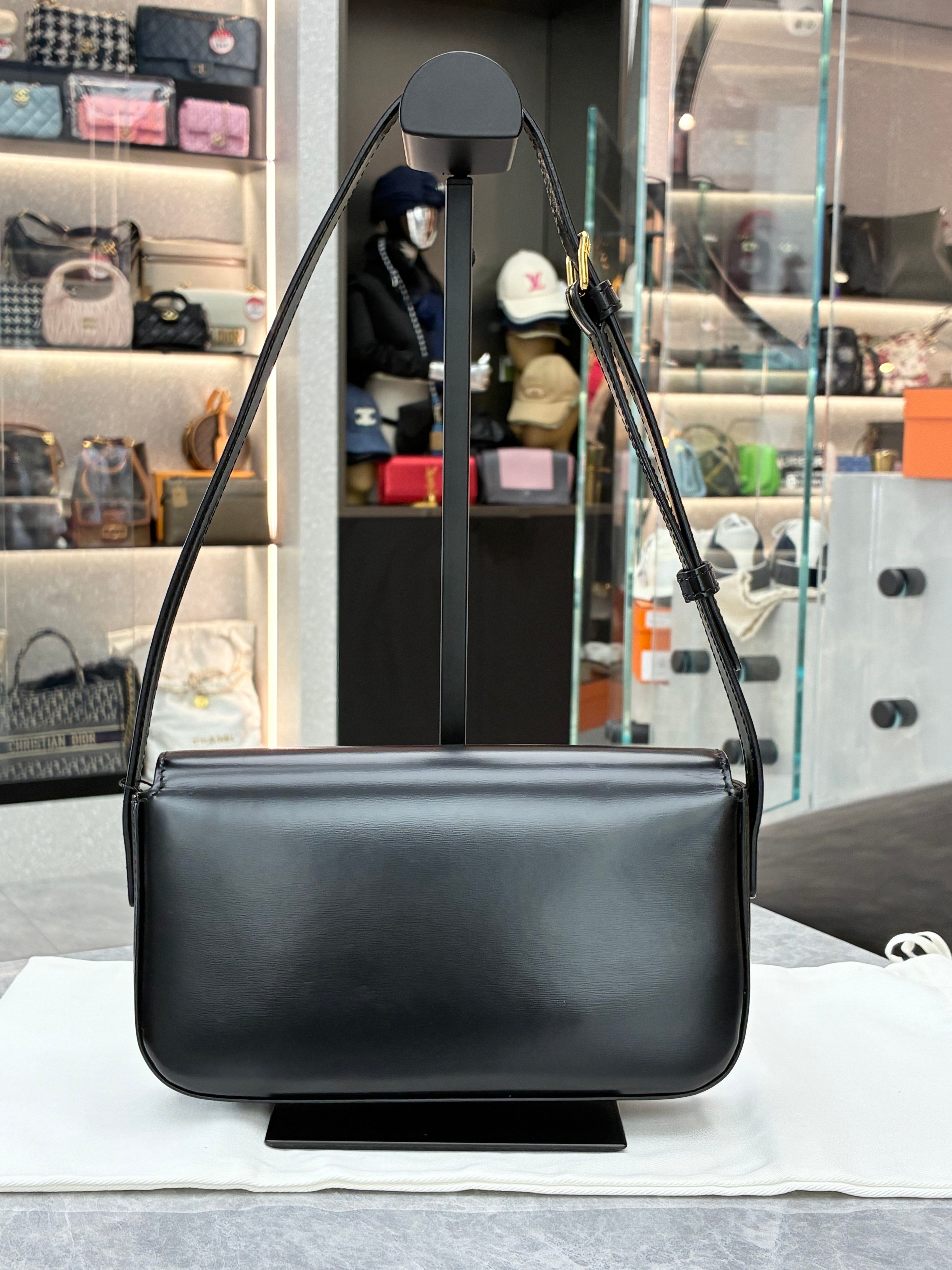Celine Teen Triomphe bag in shiny black calfskin leather
