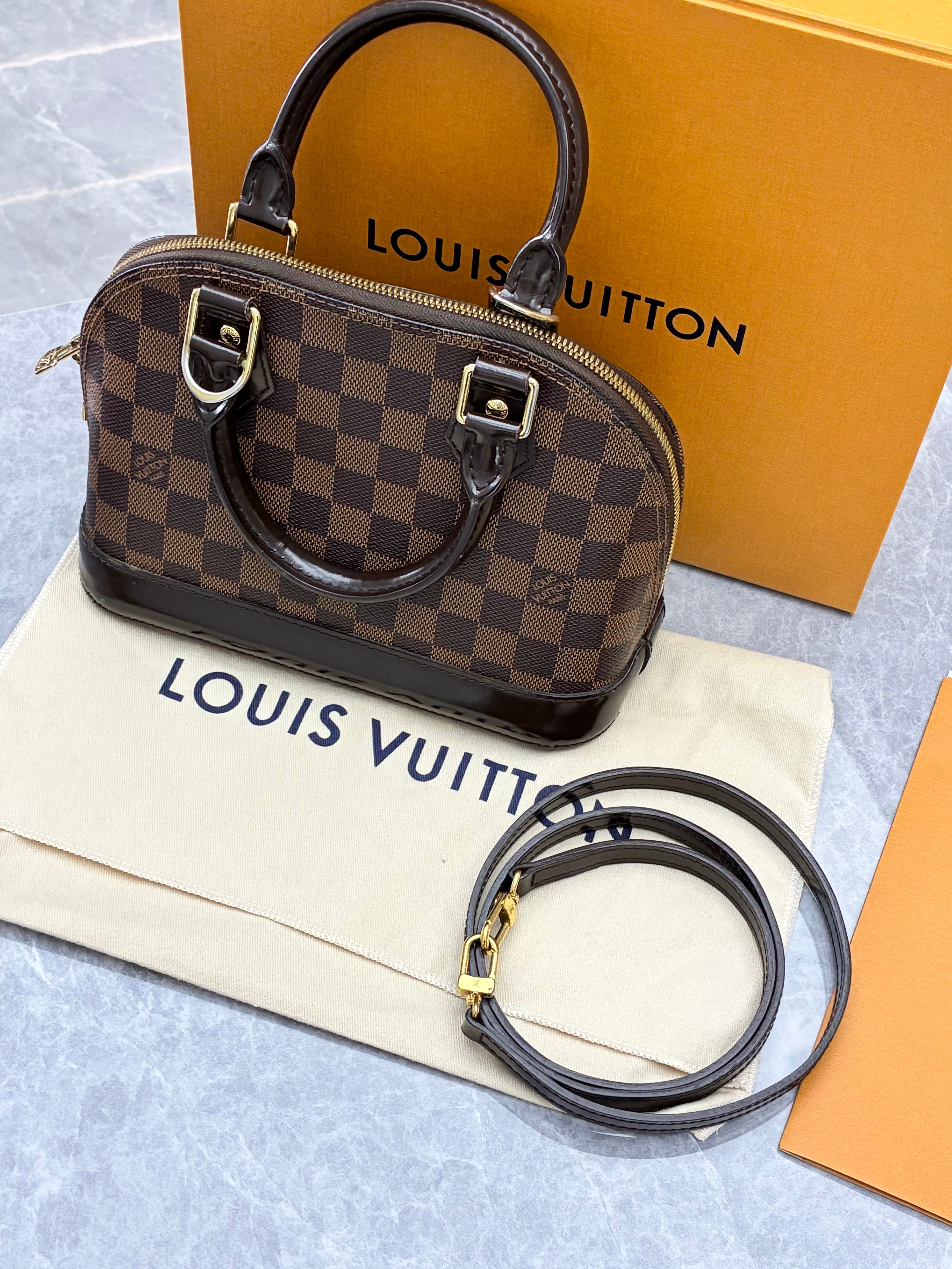 Louis Vuitton Alma BB bag in Damier Ebene canvas
