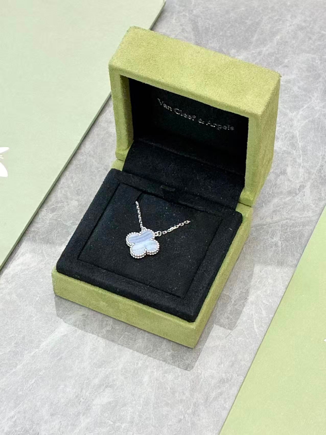 Van Cleef & Arpels Vintage Alhambra pendant necklace crafted in 18K white gold with chalcedony