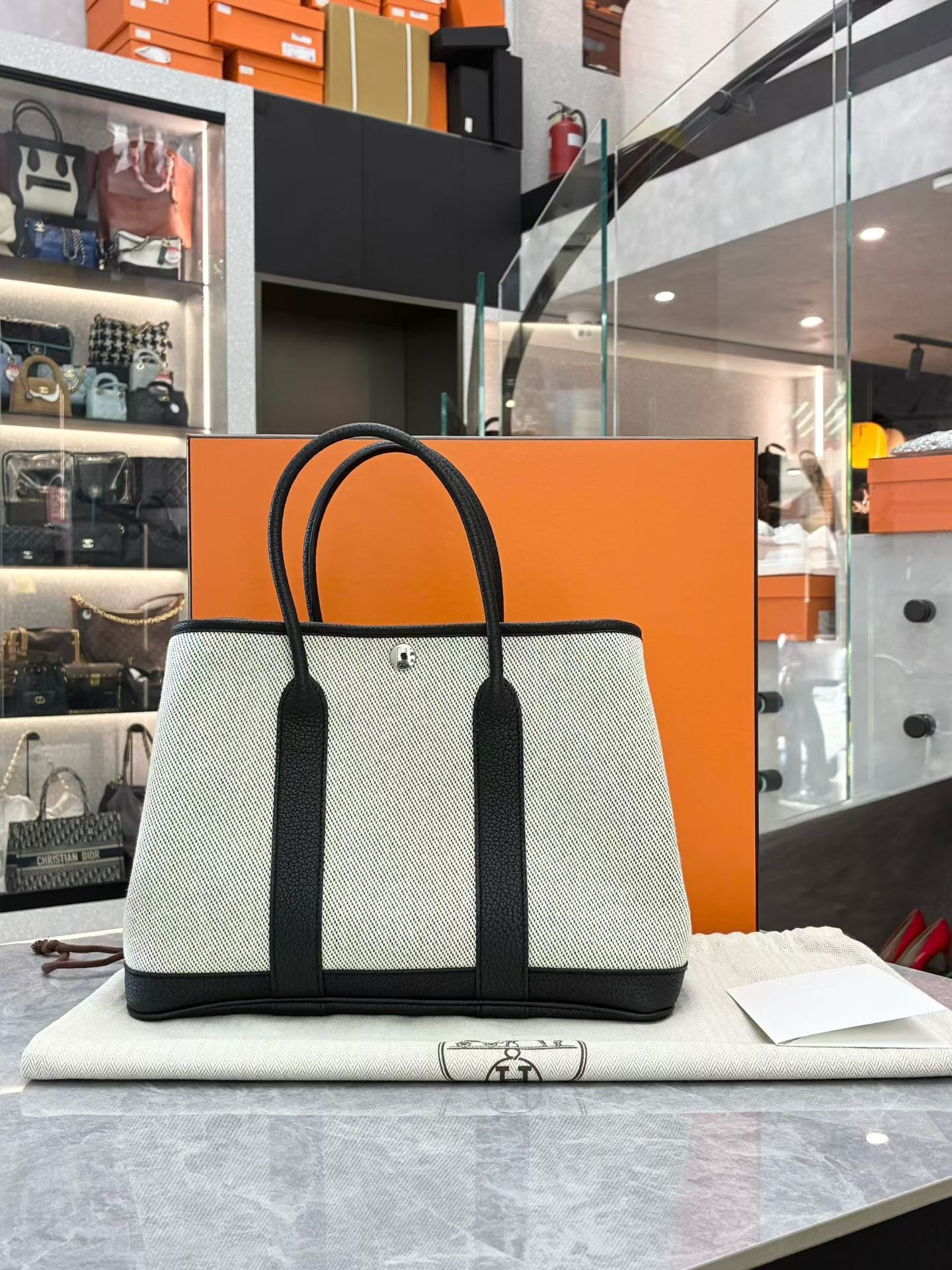 Hermès Garden Party 30 bag in Ecru and Black Negonda leather. 