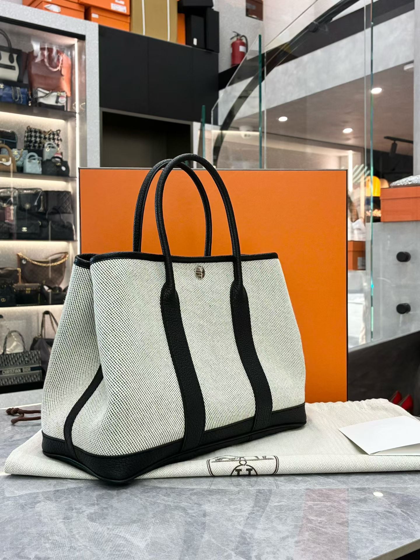 Hermès Garden Party 30 bag in Ecru and Black Negonda leather. 