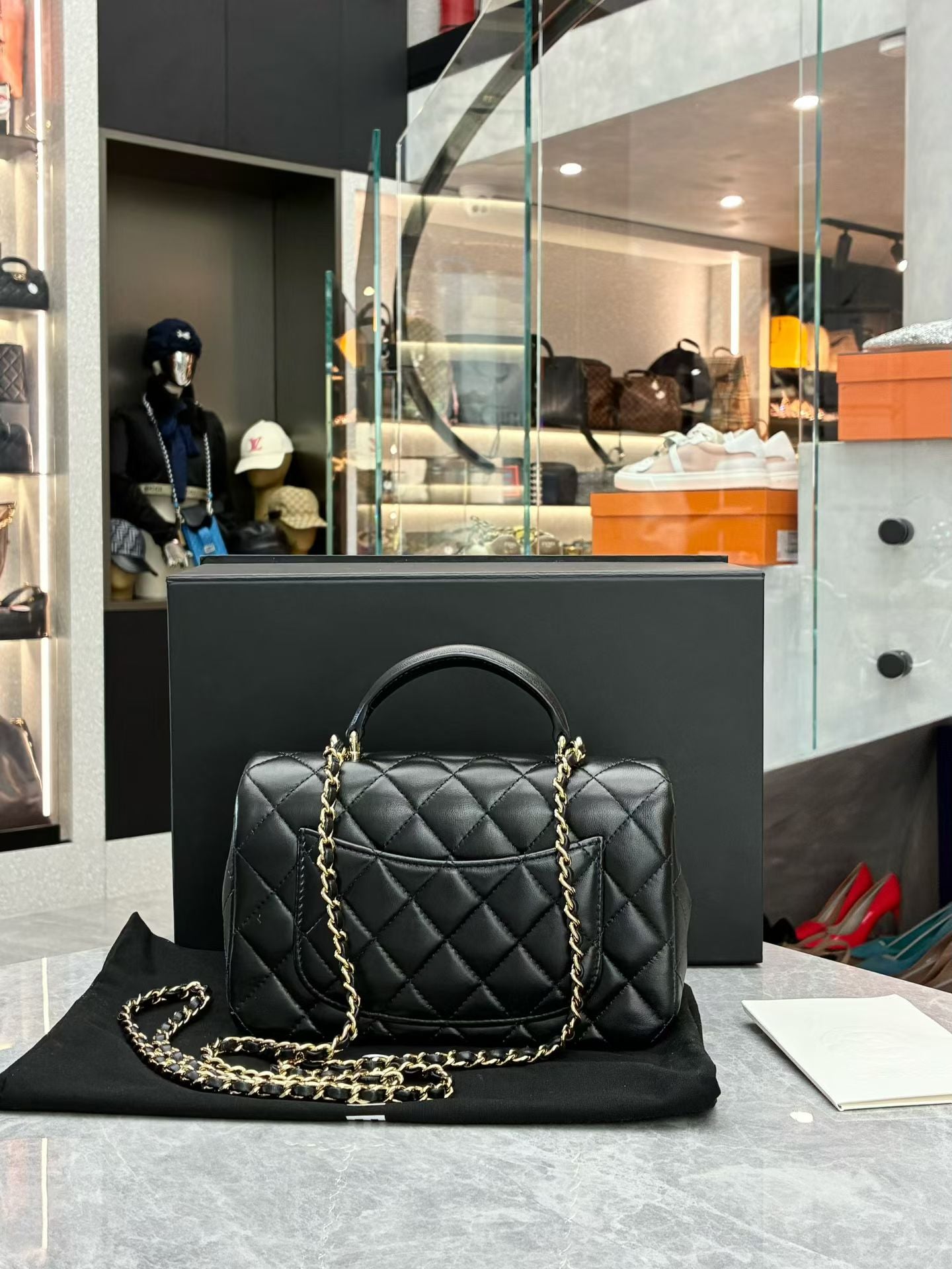 Chanel Lambskin Quilted Mini Top Handle Rectangular Flap bag in black