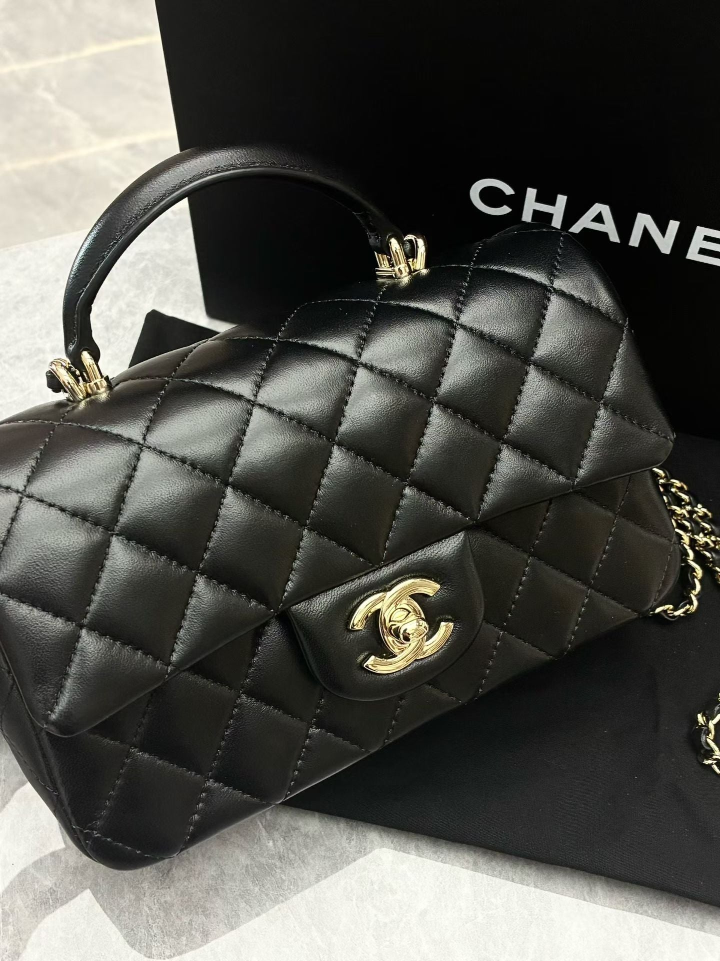 Chanel Lambskin Quilted Mini Top Handle Rectangular Flap bag in black