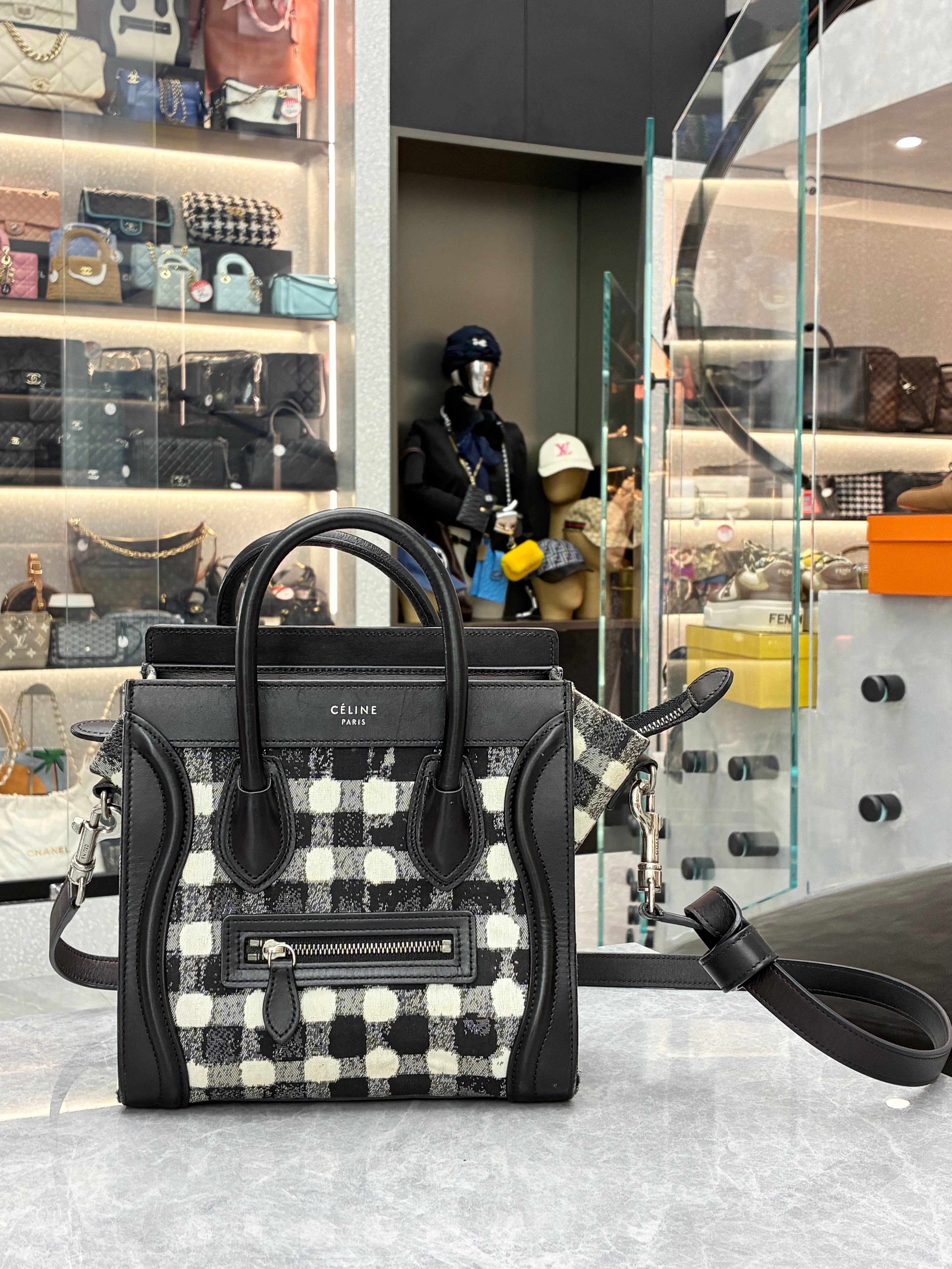 Celine Luggage Nano “Micro” bag in a distinctive black-and-white check pattern