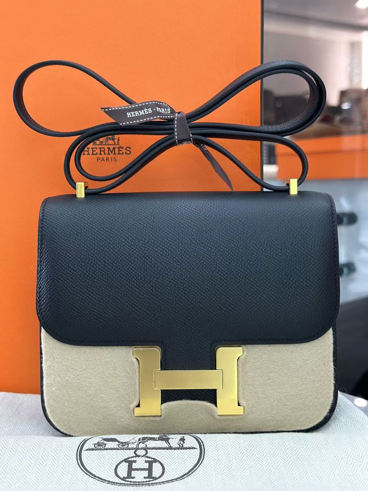 Hermès Constance 18 Mini bag crafted in black Epsom leather with a contrasting beige color (W Stamp)