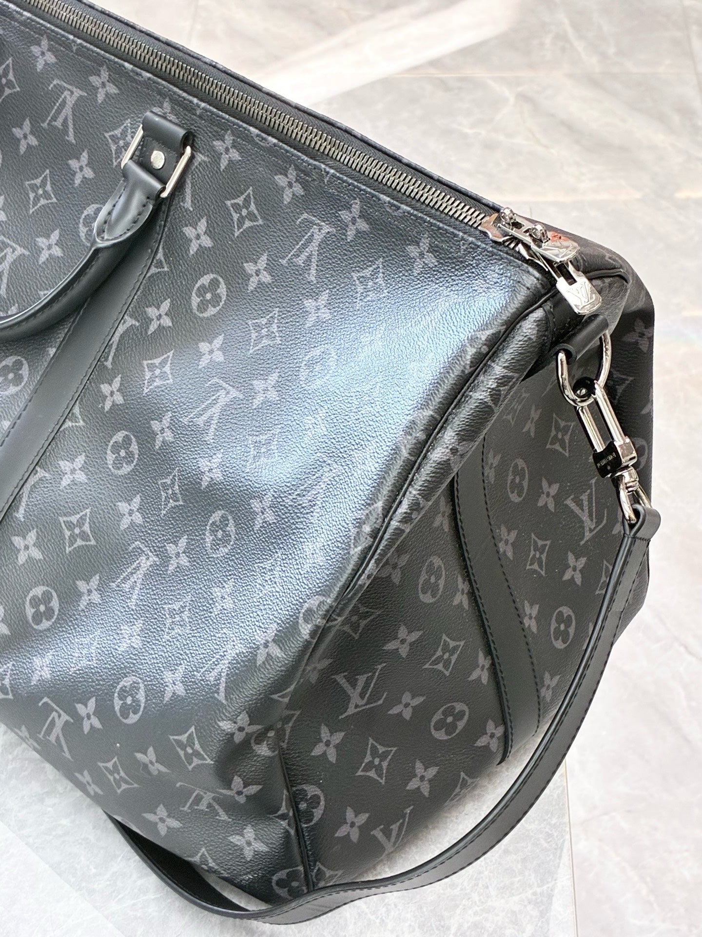 LOUIS VUITTON Keepall 55 – Monogram Eclipse Canvas, Black Cowhide, Matte Black Hardware, 55 cm, Excellent Pre-Owned
