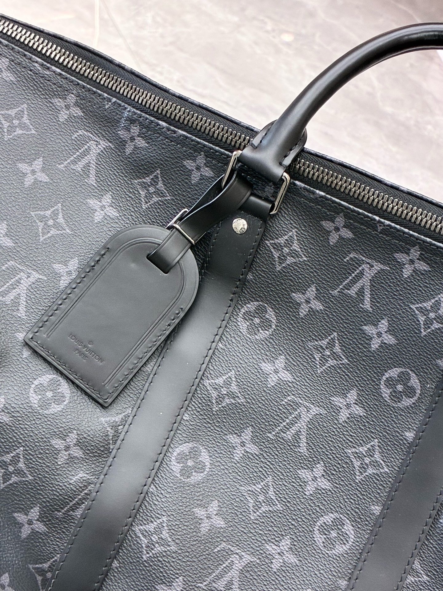LOUIS VUITTON Keepall 55 – Monogram Eclipse Canvas, Black Cowhide, Matte Black Hardware, 55 cm, Excellent Pre-Owned