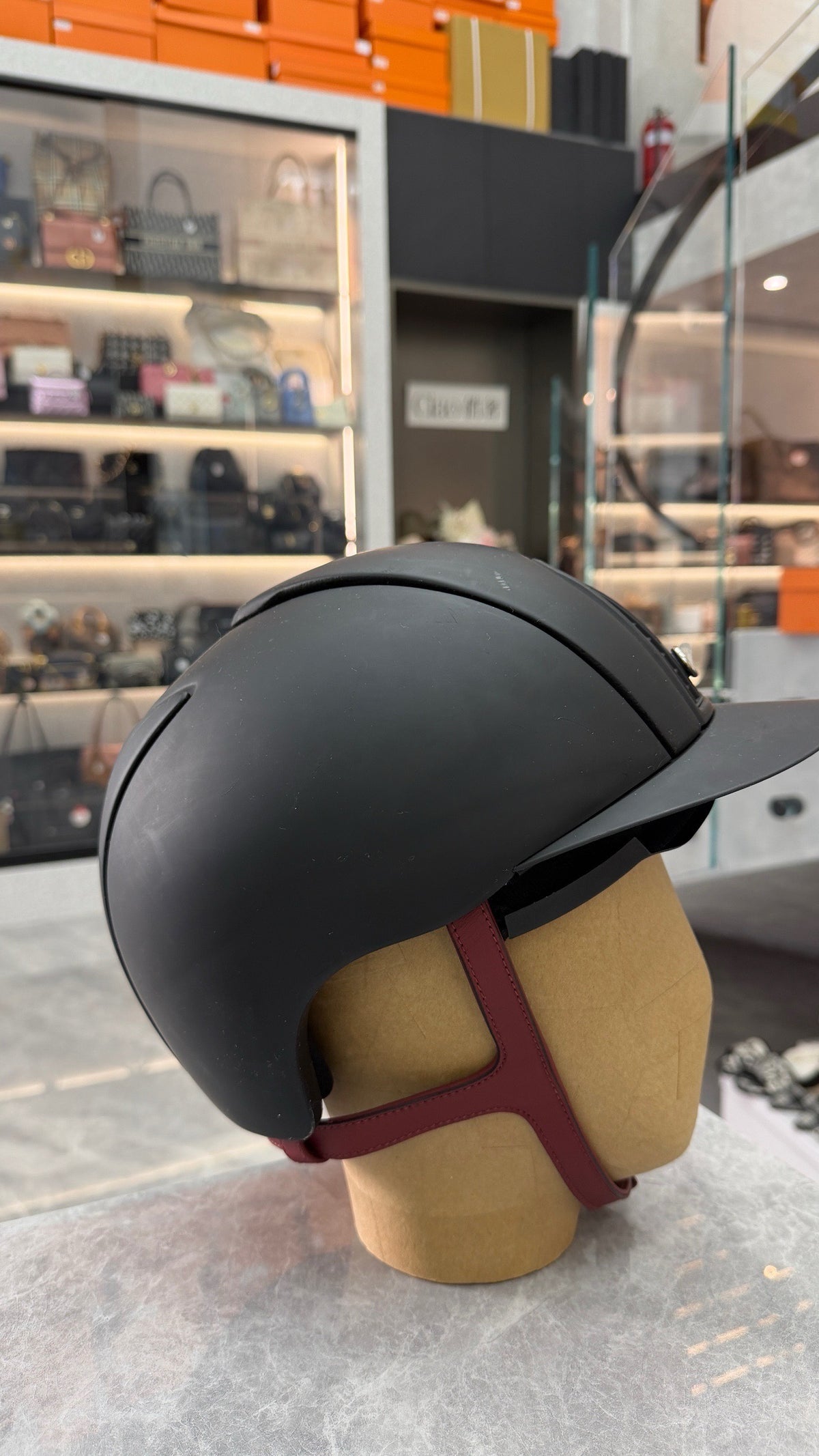 HERMÈS Riding Helmet – Matte Black Shell with Burgundy Leather Harness, Good Pre-Owned