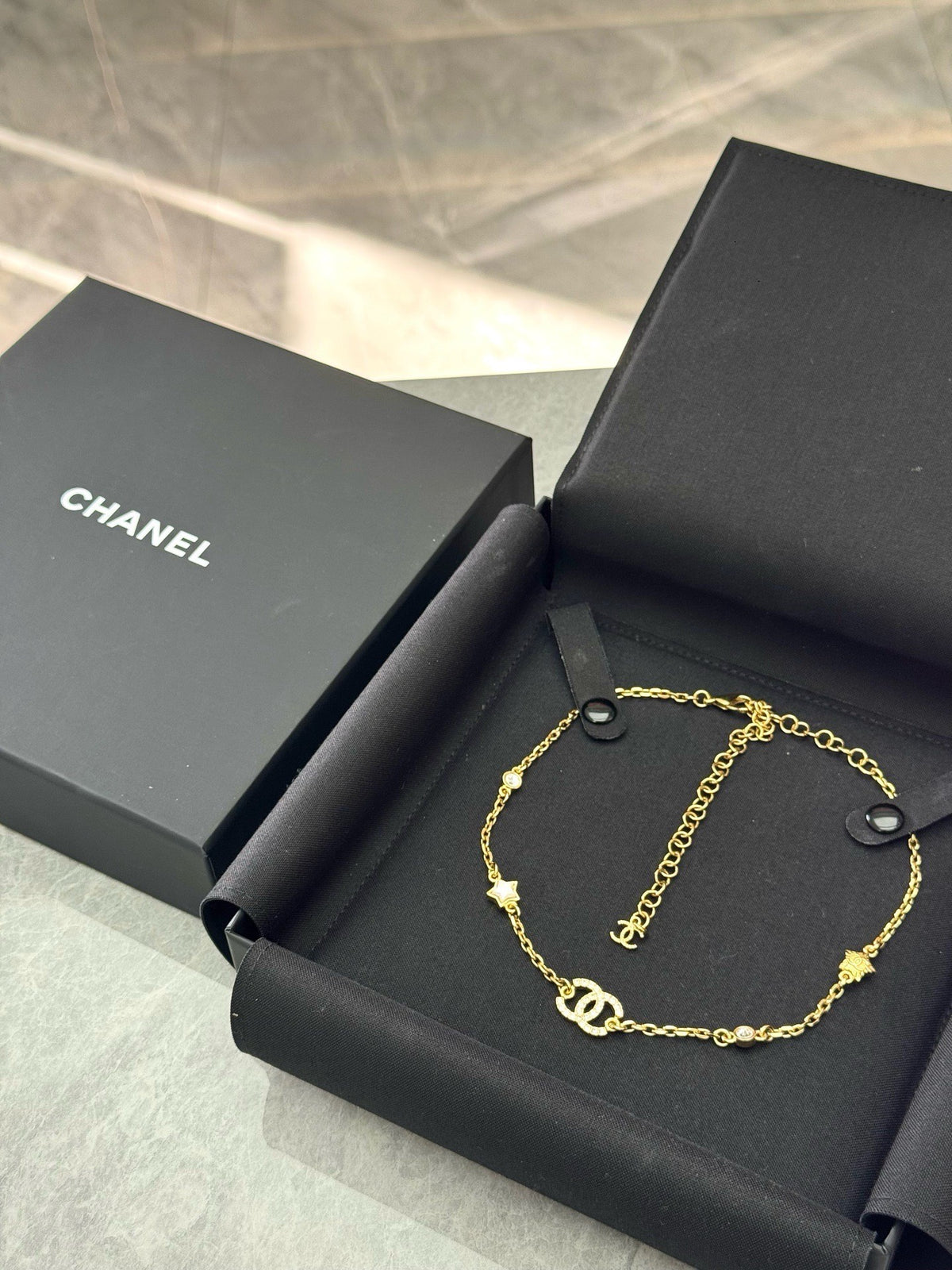 CHANEL 24C Necklace – Gold-Tone Chain with Crystal CC and Star Charms, Brand New