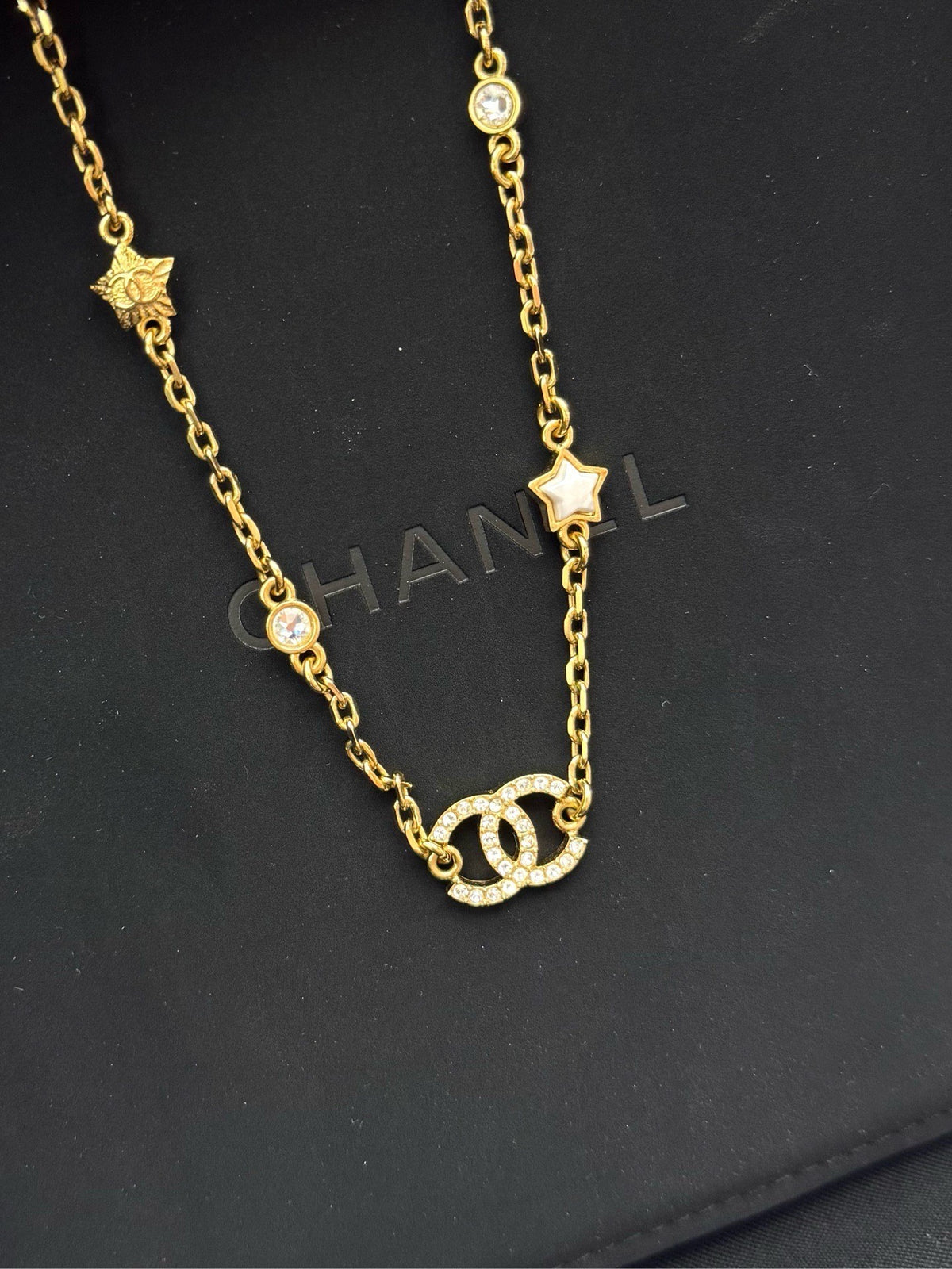 CHANEL 24C Necklace – Gold-Tone Chain with Crystal CC and Star Charms, Brand New
