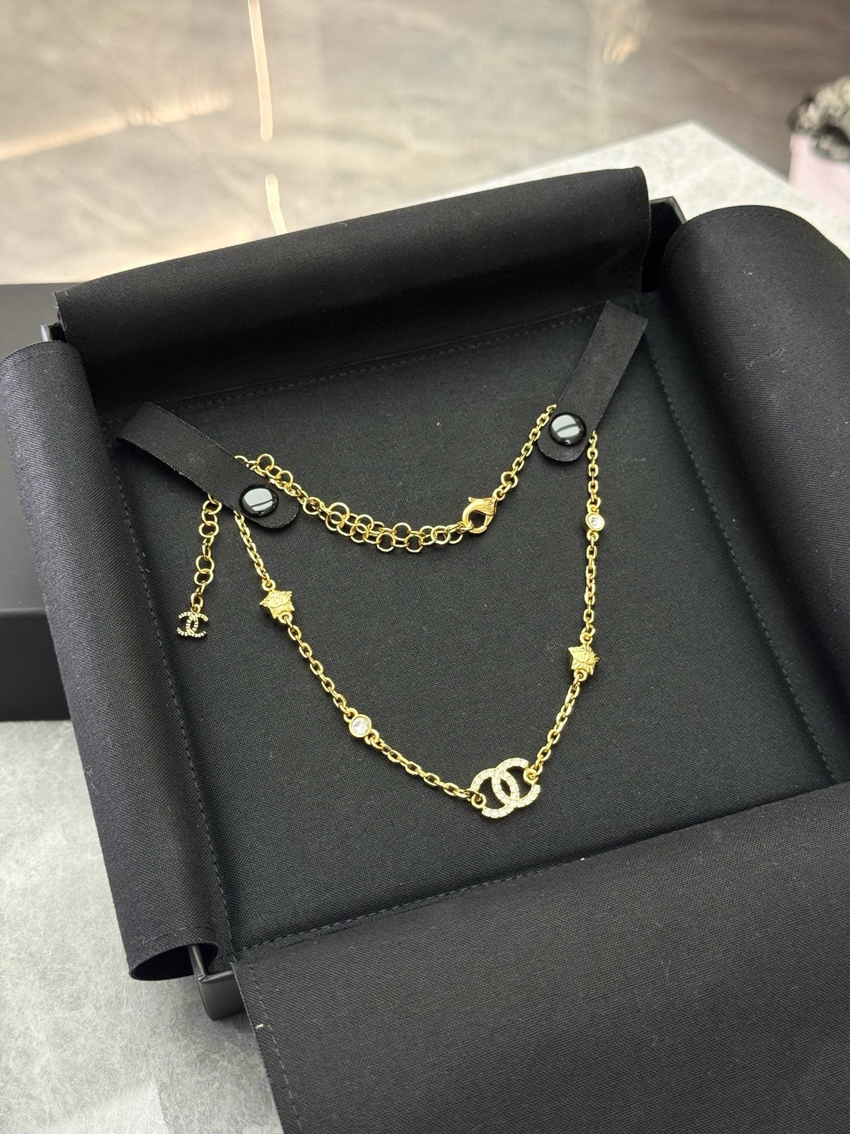 CHANEL 24C Necklace – Gold-Tone Chain with Crystal CC and Star Charms, Brand New