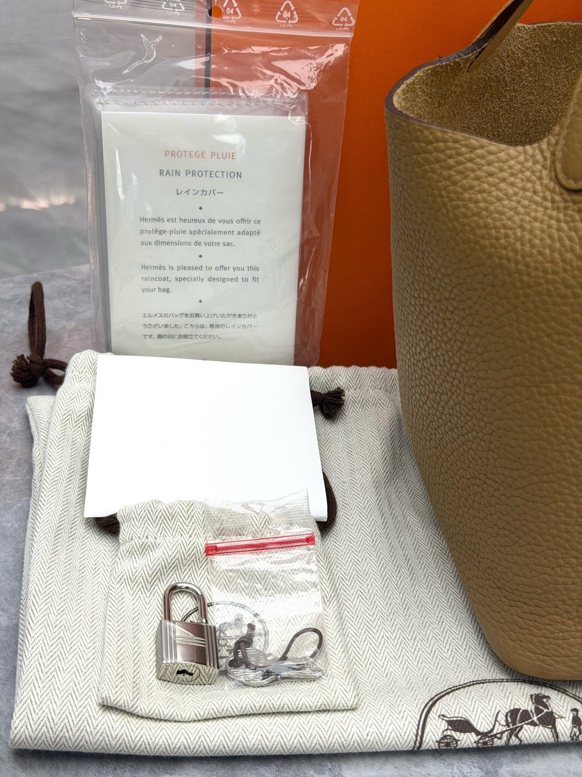 HERMÈS Picotin Lock 18 – Biscuit Taurillon Clemence, Palladium Hardware, B Stamp, Excellent Pre-Owned