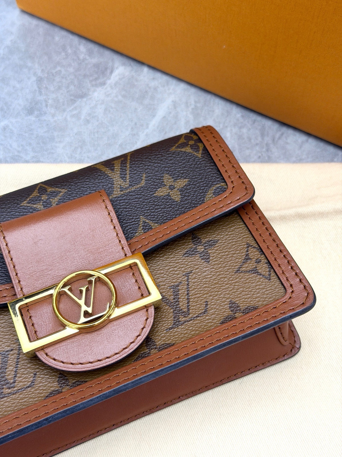 LOUIS VUITTON Dauphine – Monogram and Monogram Reverse Canvas with Gold LV Circle Clasp, Very Good Pre-Owned