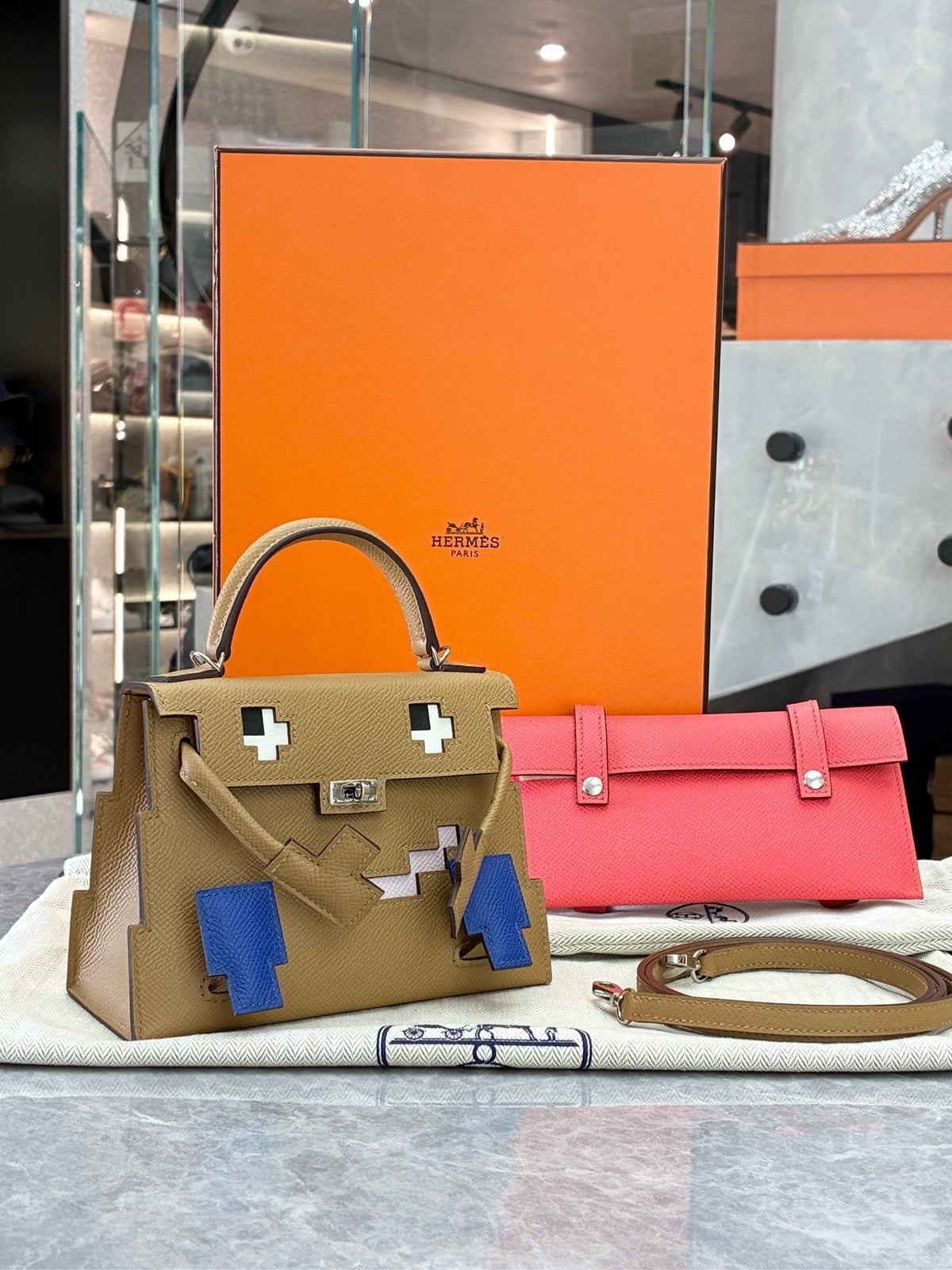 HERMÈS Kelly Doll – Biscuit Epsom with Bleu France Pixel Mosaic, Palladium Hardware, W Stamp, Brand New
