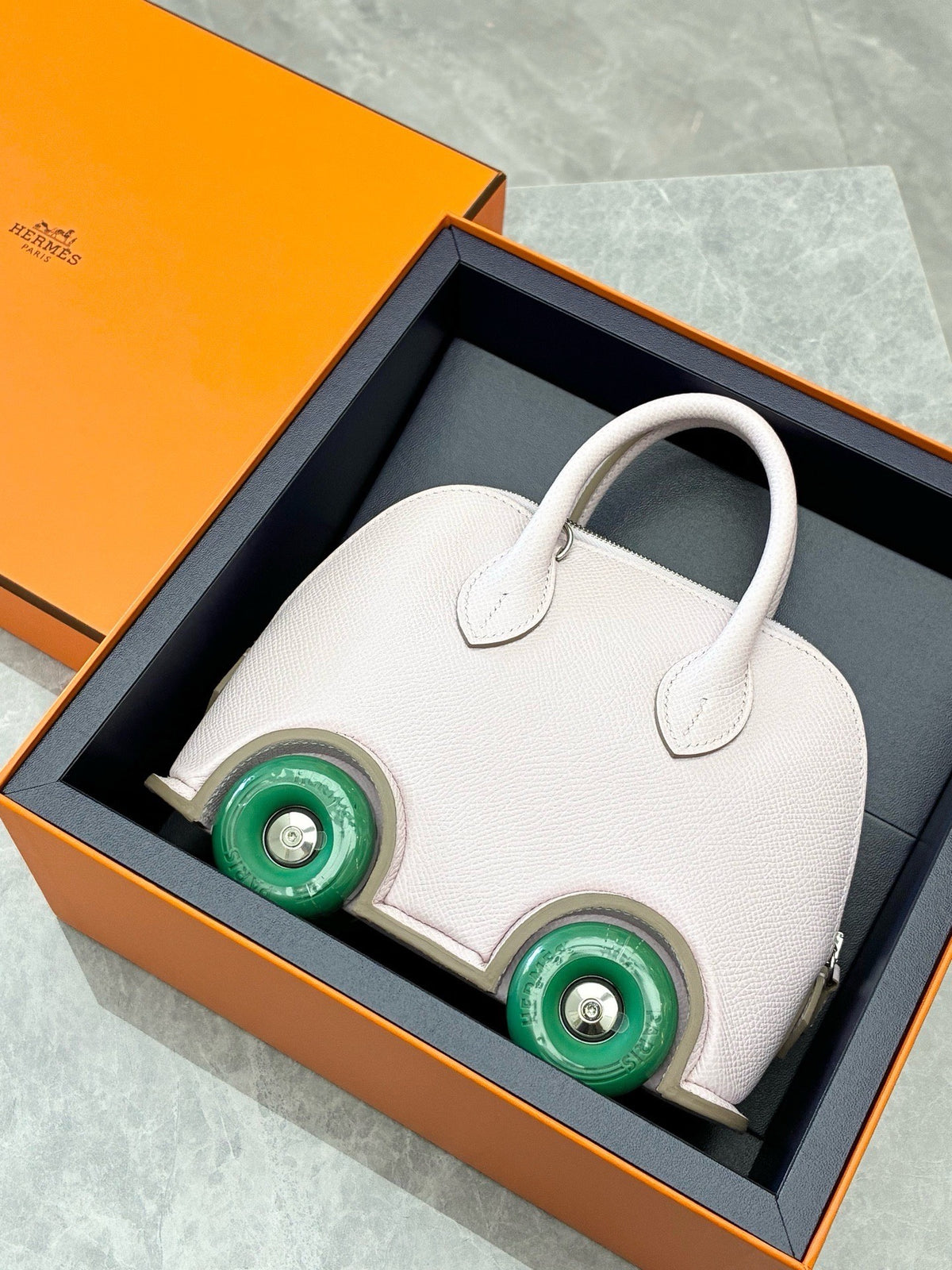 HERMÈS Bolide on Wheels – Pale Lilac Epsom with Green Wheels, Palladium Hardware, W Stamp, Excellent Pre-Owned