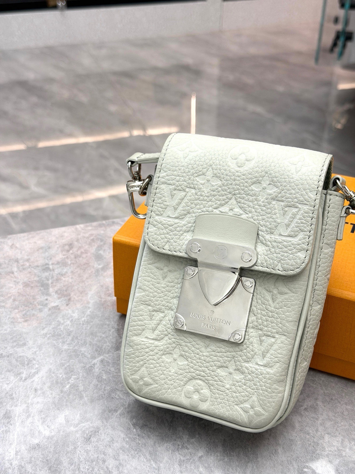 LOUIS VUITTON S-Lock Vertical – Pale Grey-Green Embossed Monogram Calfskin, Silver Hardware, Excellent Pre-Owned