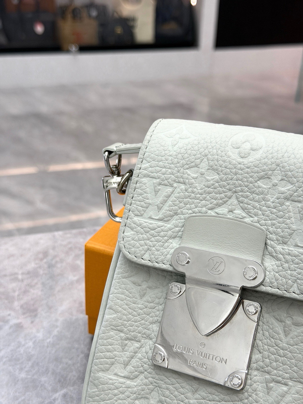 LOUIS VUITTON S-Lock Vertical – Pale Grey-Green Embossed Monogram Calfskin, Silver Hardware, Excellent Pre-Owned