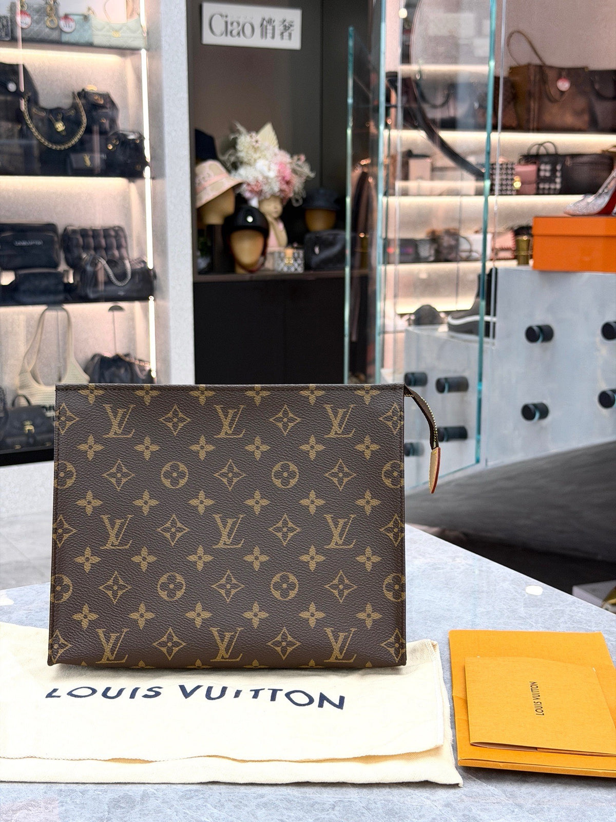 LOUIS VUITTON Toiletry Pouch 26 – Monogram Canvas with Natural Vachetta Leather, Good Pre-Owned