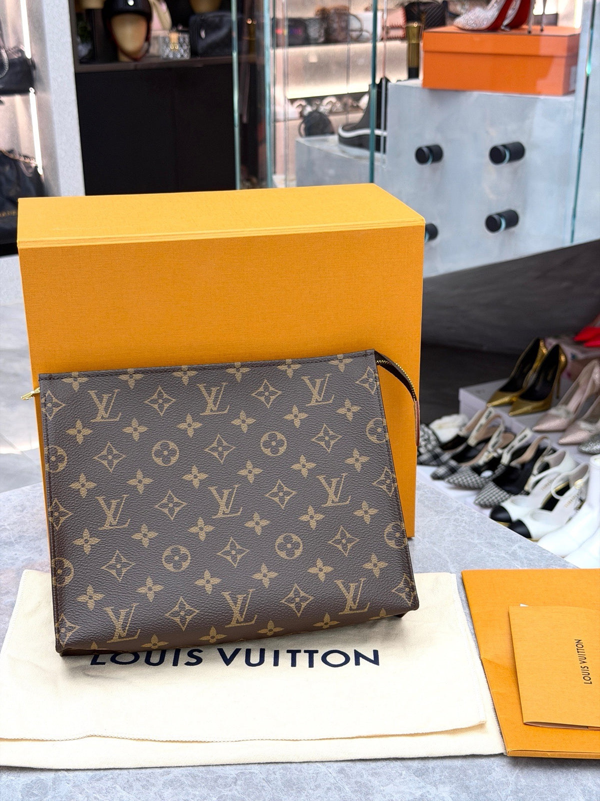 LOUIS VUITTON Toiletry Pouch 26 – Monogram Canvas with Natural Vachetta Leather, Good Pre-Owned